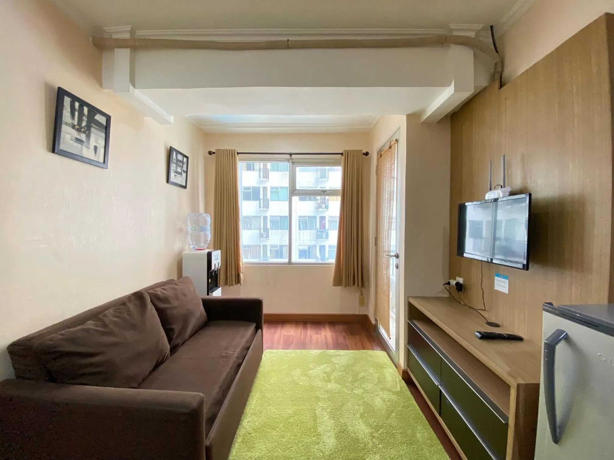 Cozy Living 2BR Apartment at Jarrdin Cihampelas By Travelio