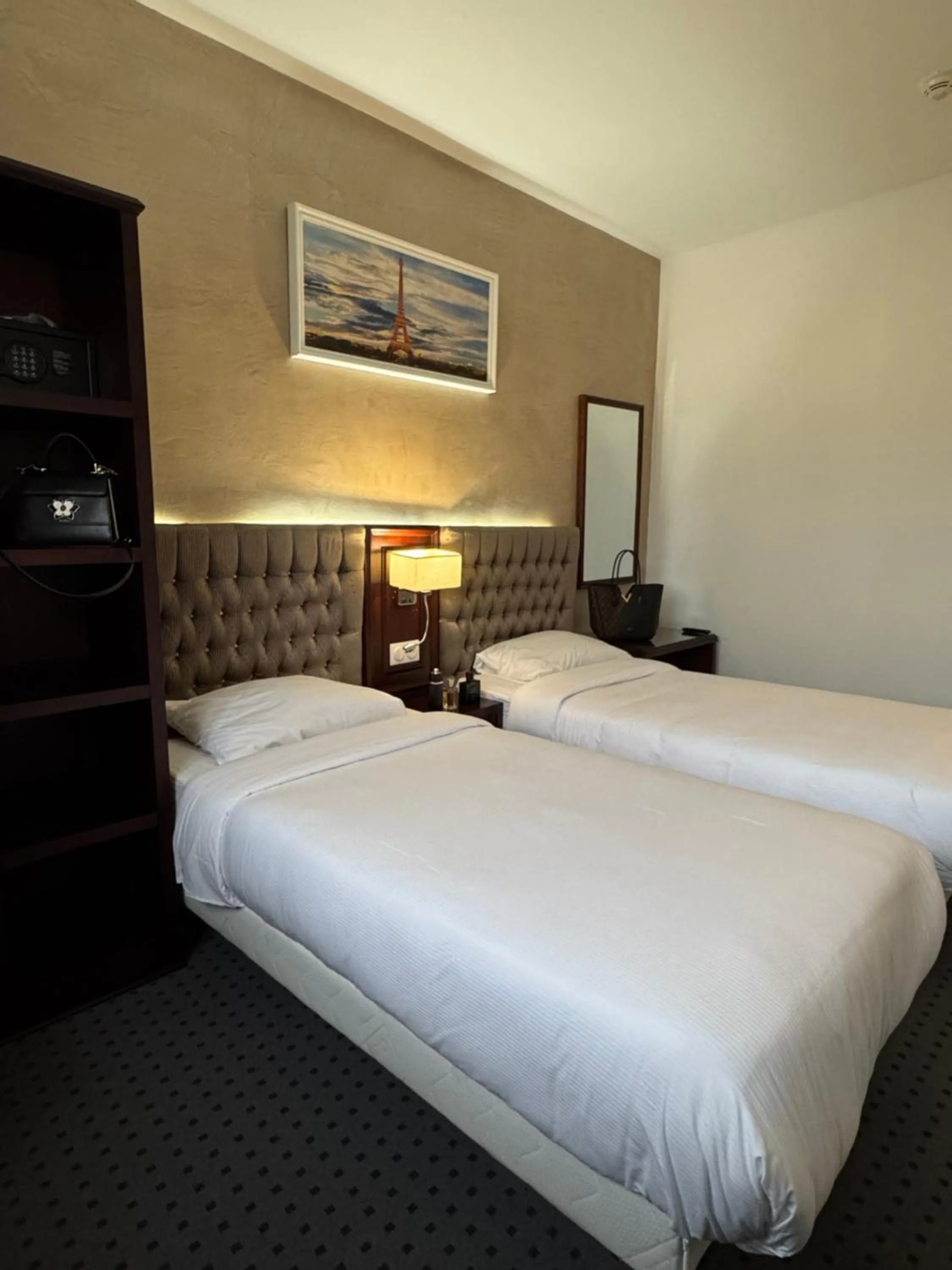 Bed in Hotel Grand Paris