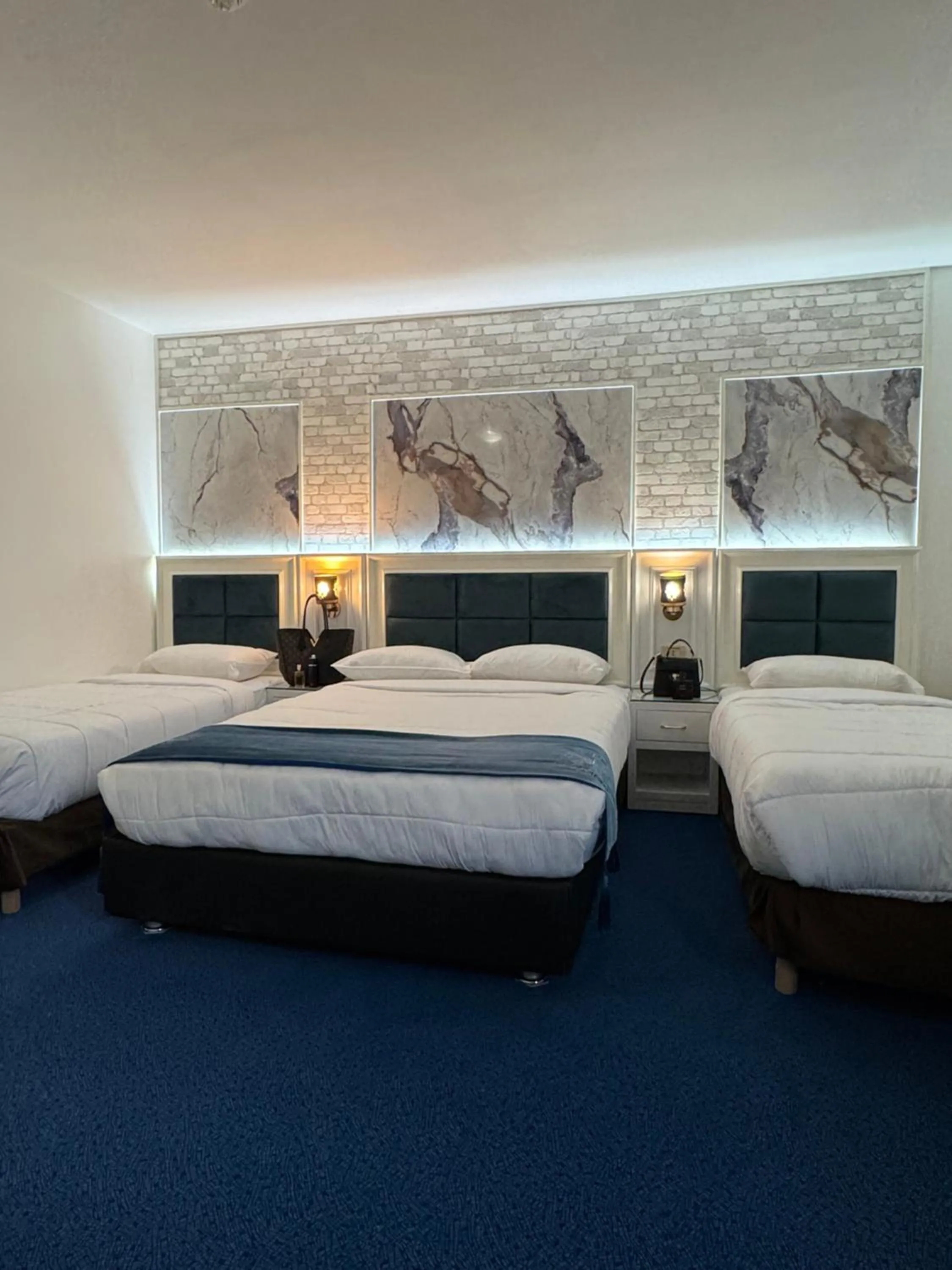 Bed in Hotel Grand Paris