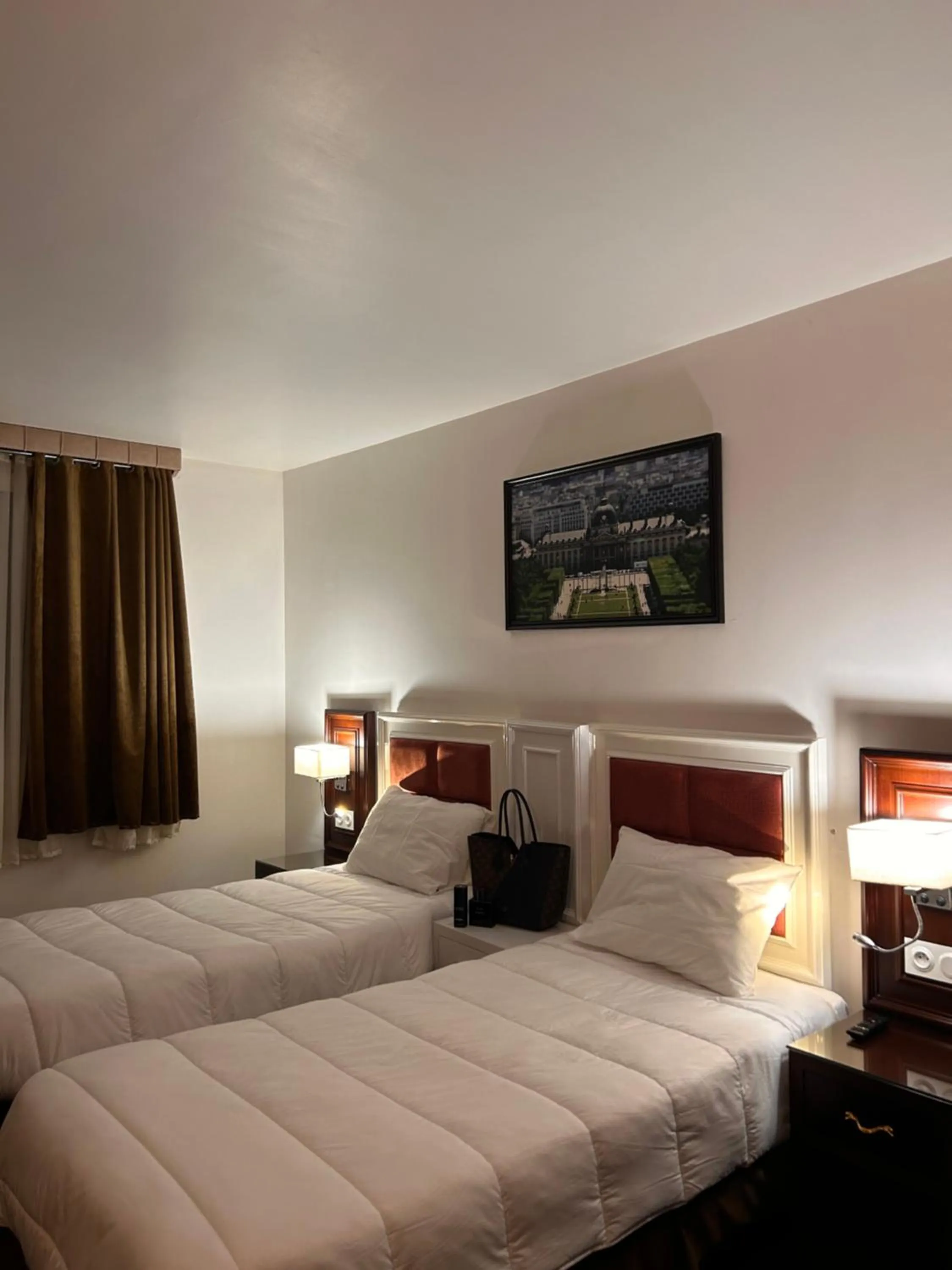 Bed in Hotel Grand Paris