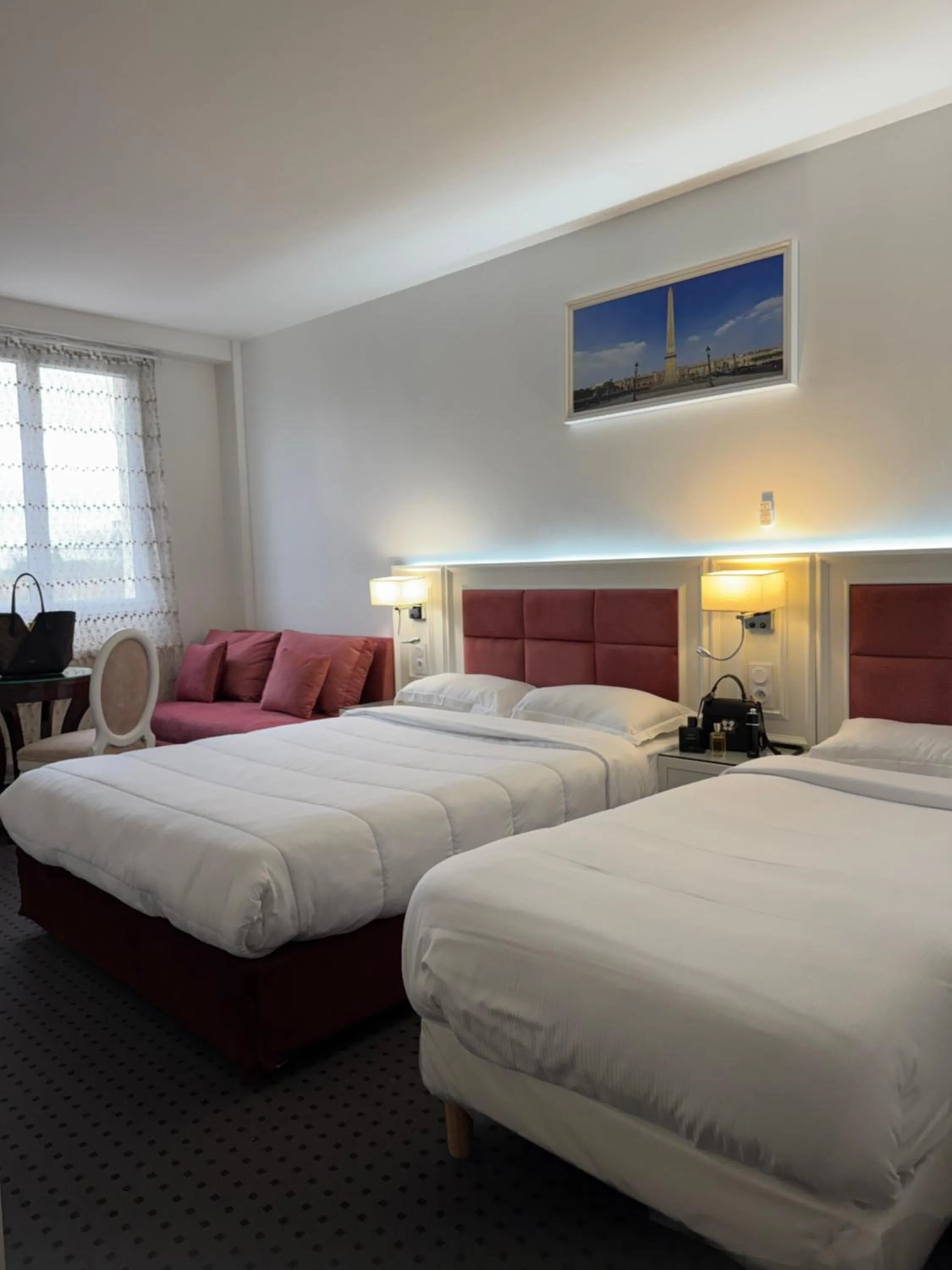 Bed in Hotel Grand Paris