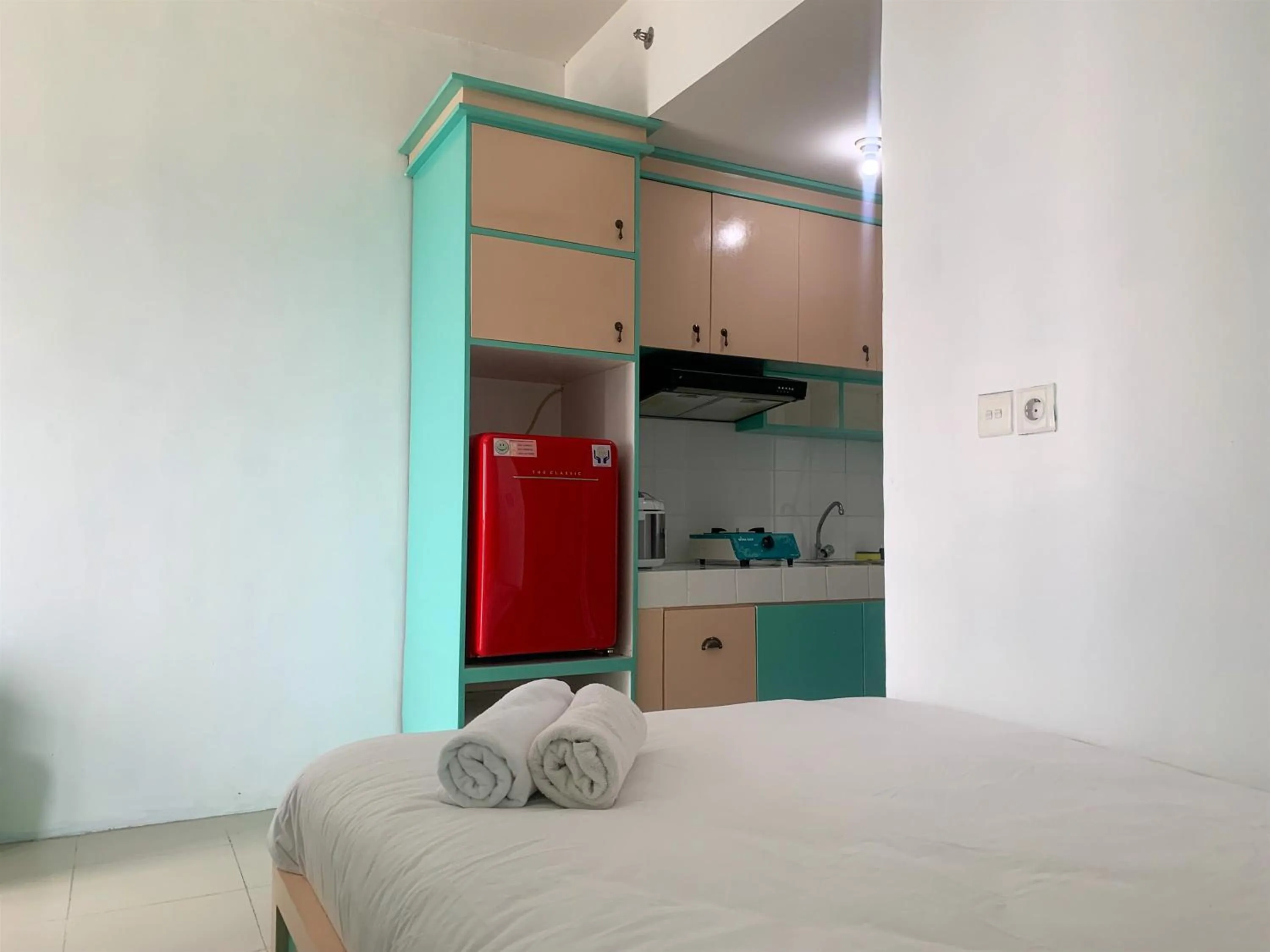 Bed in Cozy Studio at Park View Condominium Apartment By Travelio