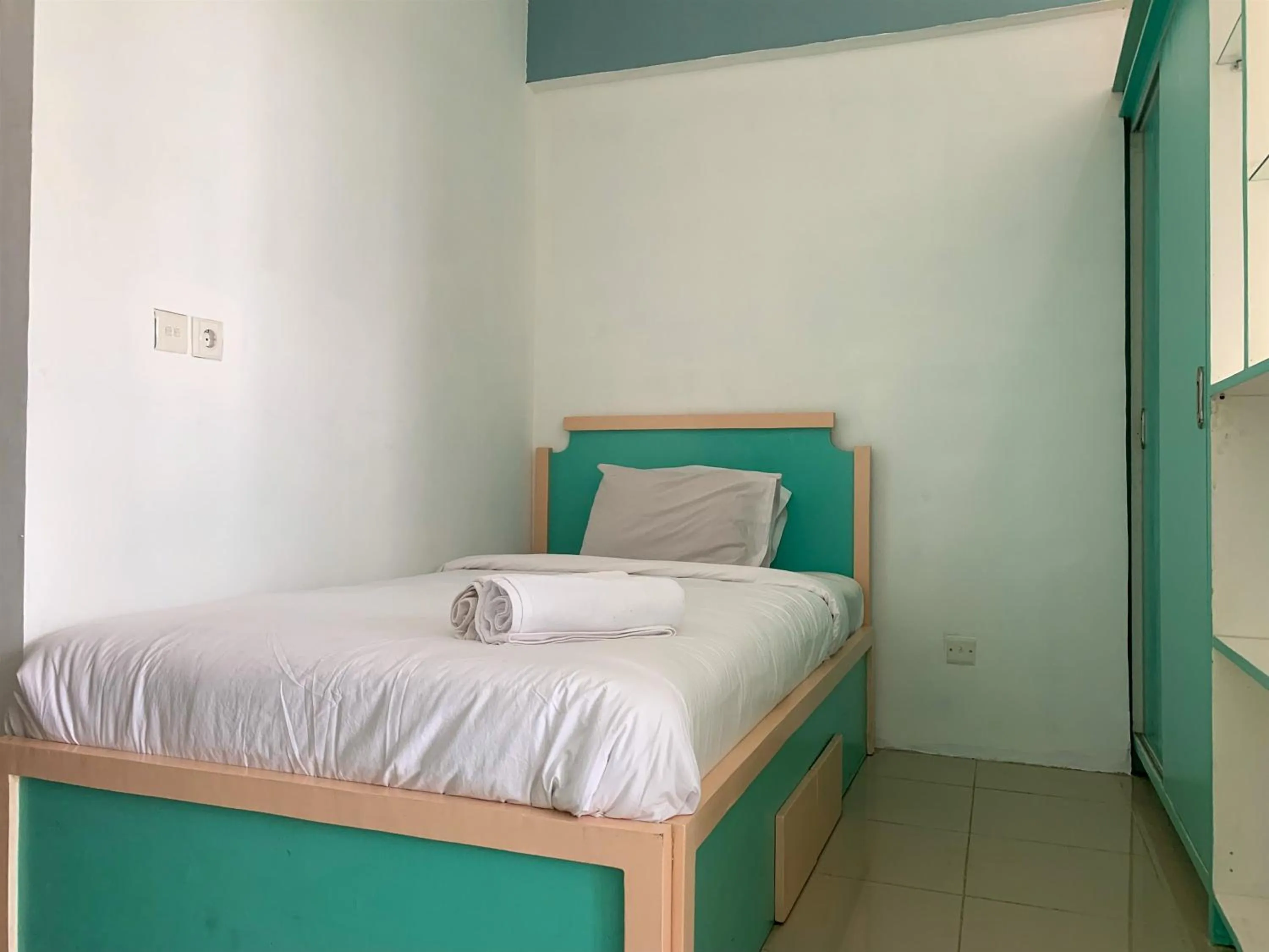 Bedroom, Bed in Cozy Studio at Park View Condominium Apartment By Travelio