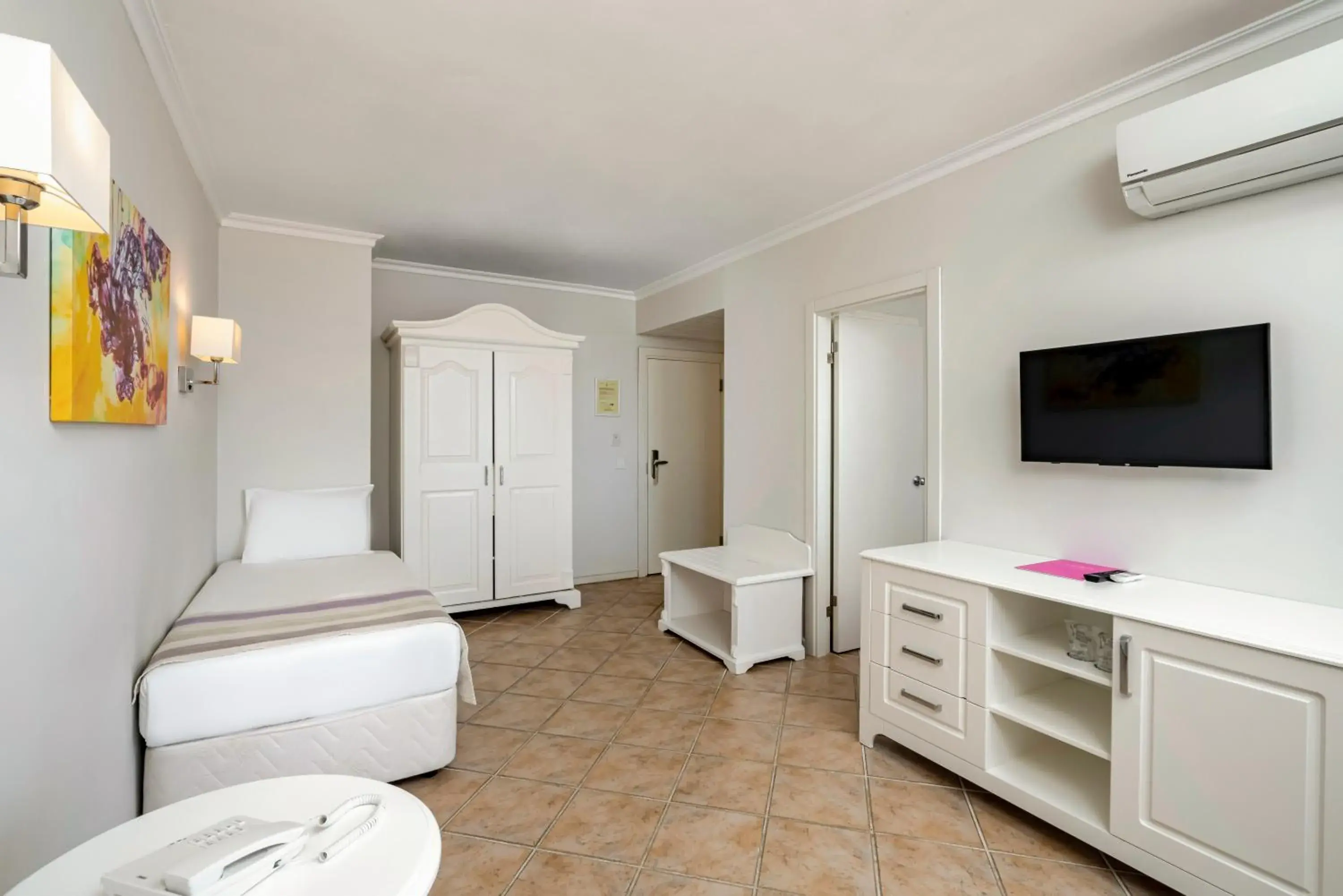 Bed in Iz Flower Side Beach Hotel Bed in Iz Flower Side Beach Hotel