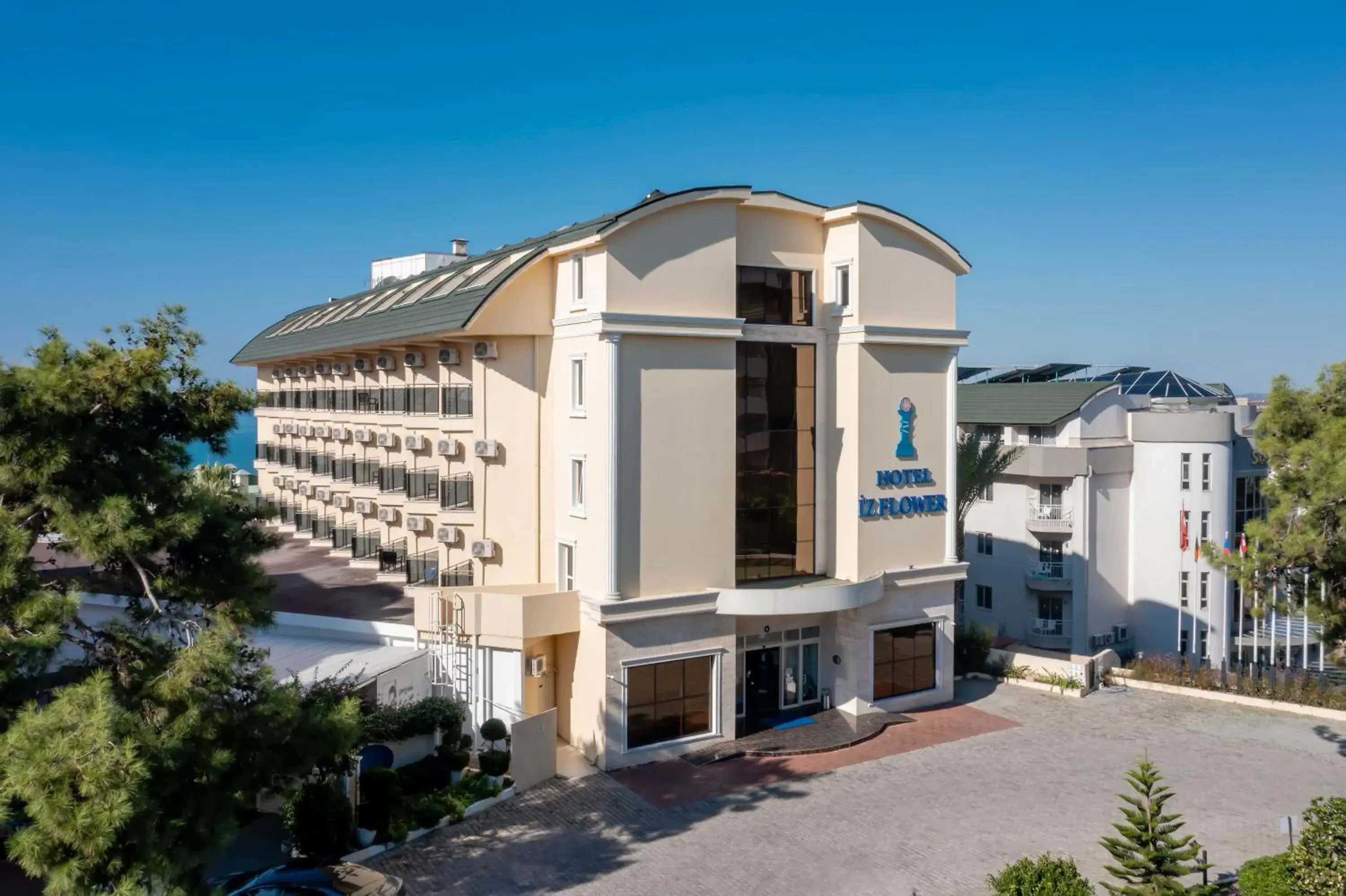 Property building in Iz Flower Side Beach Hotel Property building in Iz Flower Side Beach Hotel