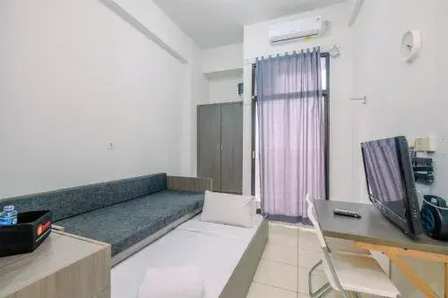 Comfortable and Minimalist Studio at Dave Apartment By Travelio Comfortable and Minimalist Studio at Dave Apartment By Travelio