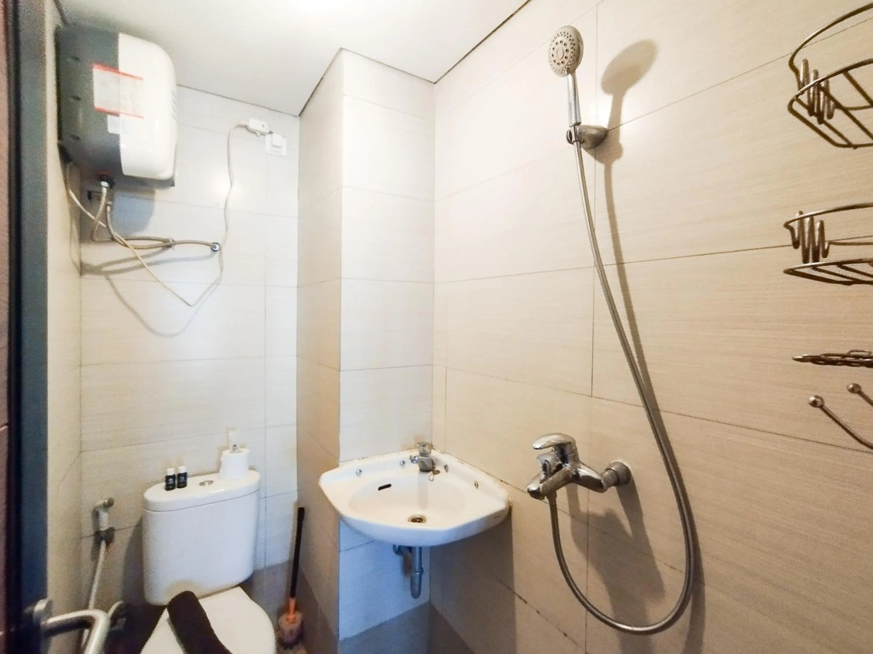 Bathroom in Spacious Chic Studio Room Apartment at Gateway Pasteur By Travelio