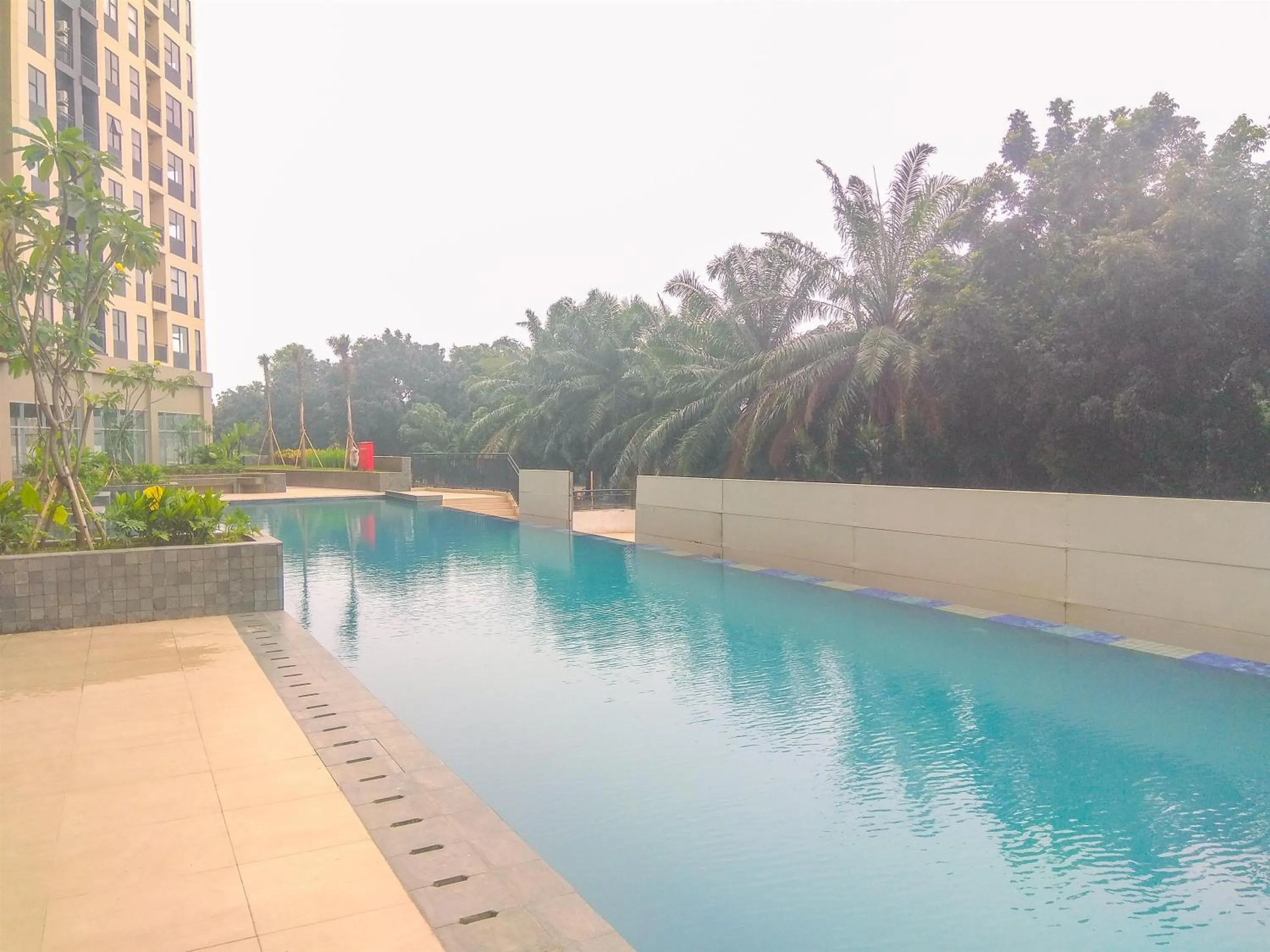 Cozy Studio at Transpark Cibubur Apartment By Travelio