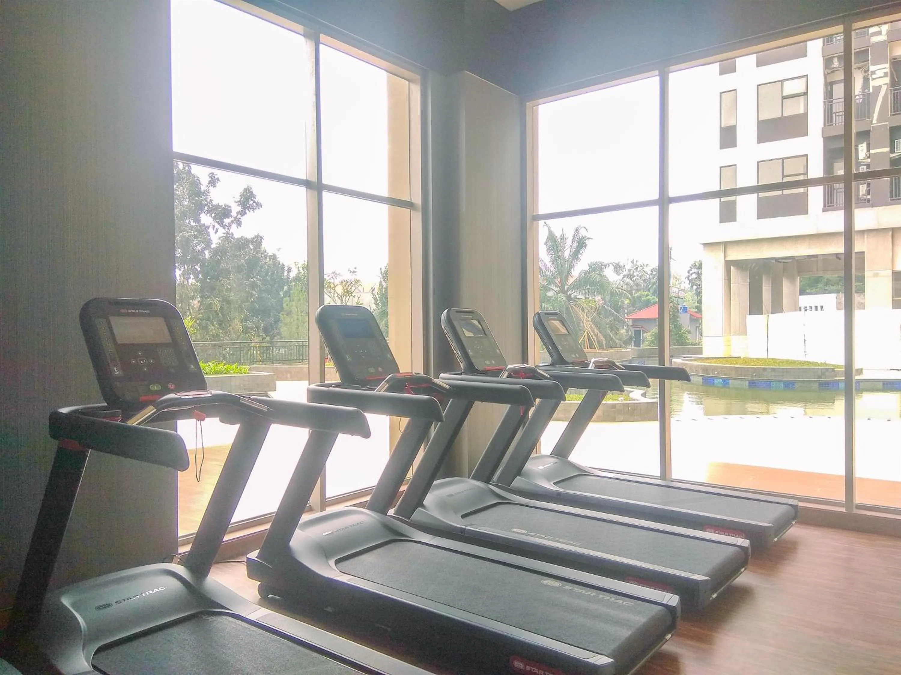 Fitness centre/facilities in Cozy Studio at Transpark Cibubur Apartment By Travelio