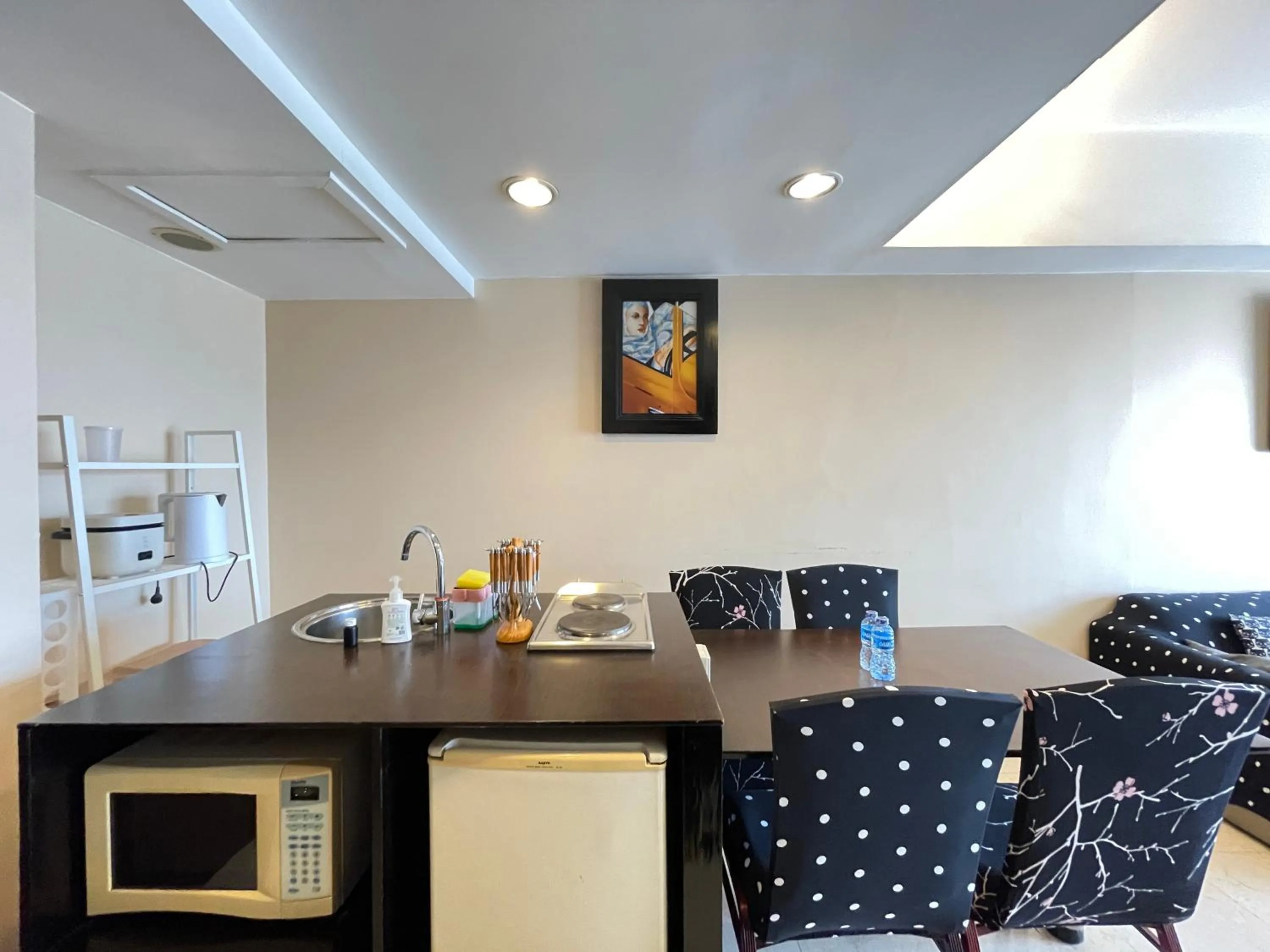 Kitchen or kitchenette in Strategic and Spacious 2BR at Apartment Braga City Walk By Travelio