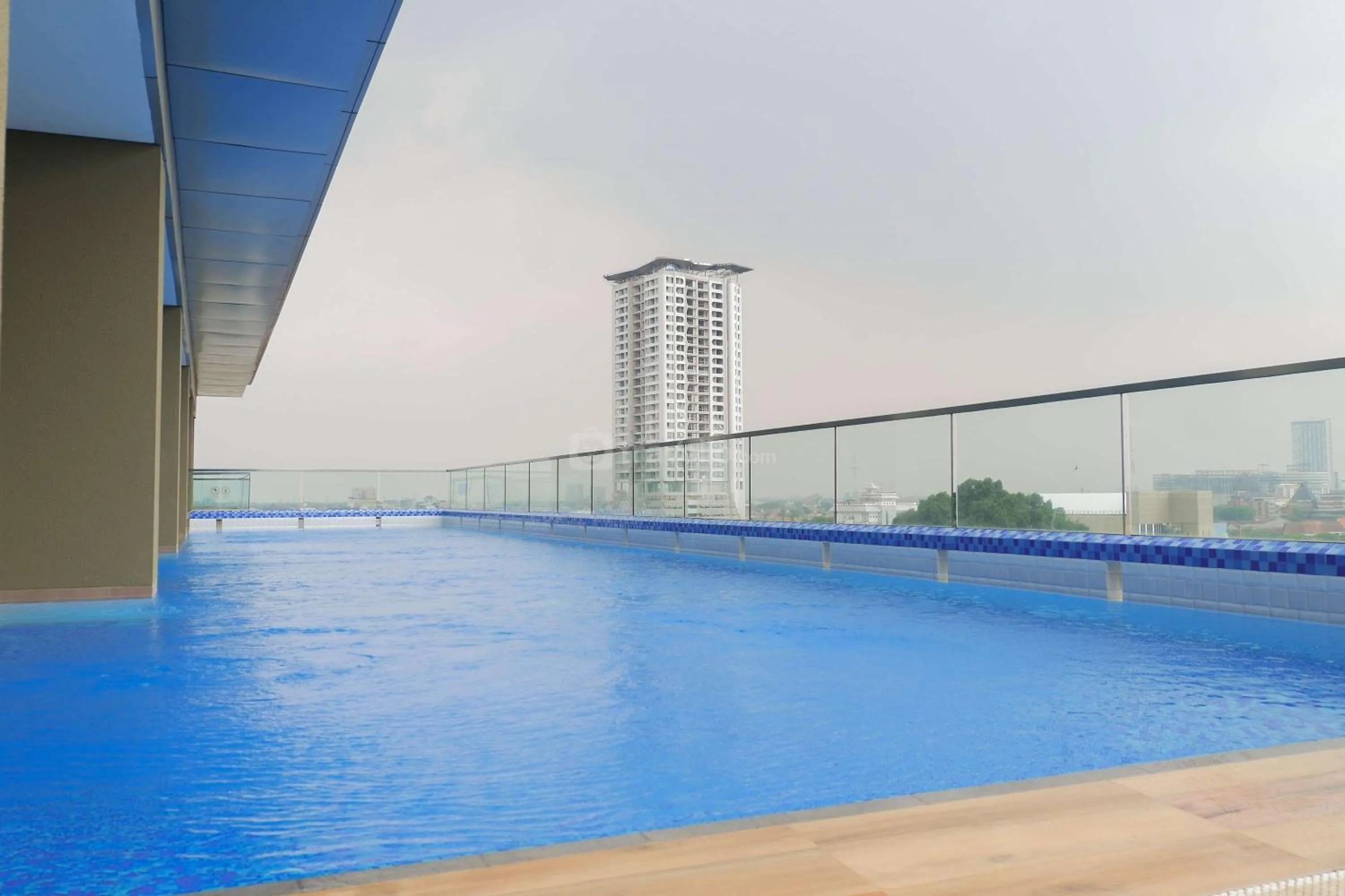 Property building in 1BR Stunning and Cozy Apartment at Praxis By Travelio