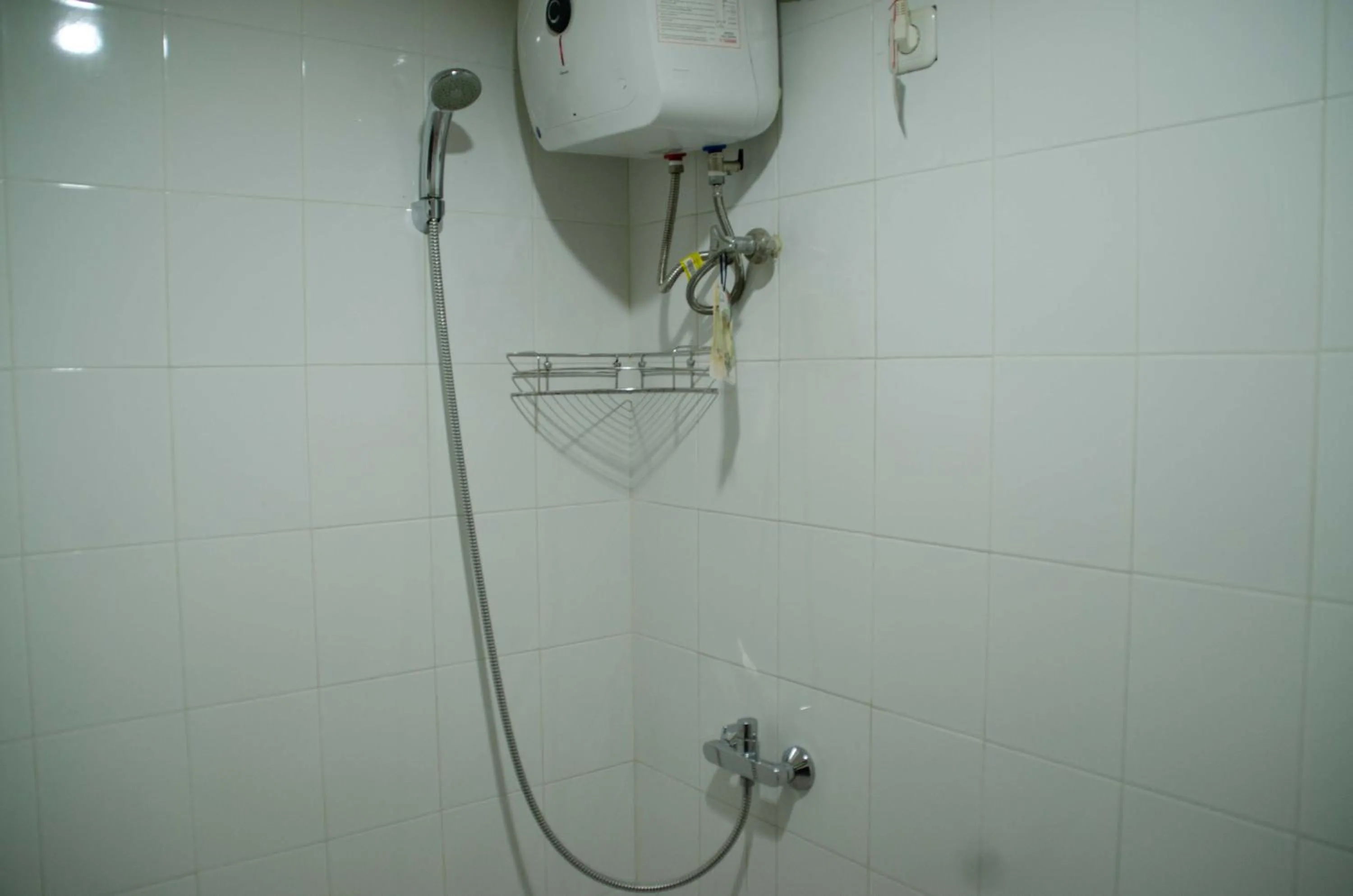 Spacious and Homey 3BR at Kondominium Rajawali Apartment By Travelio