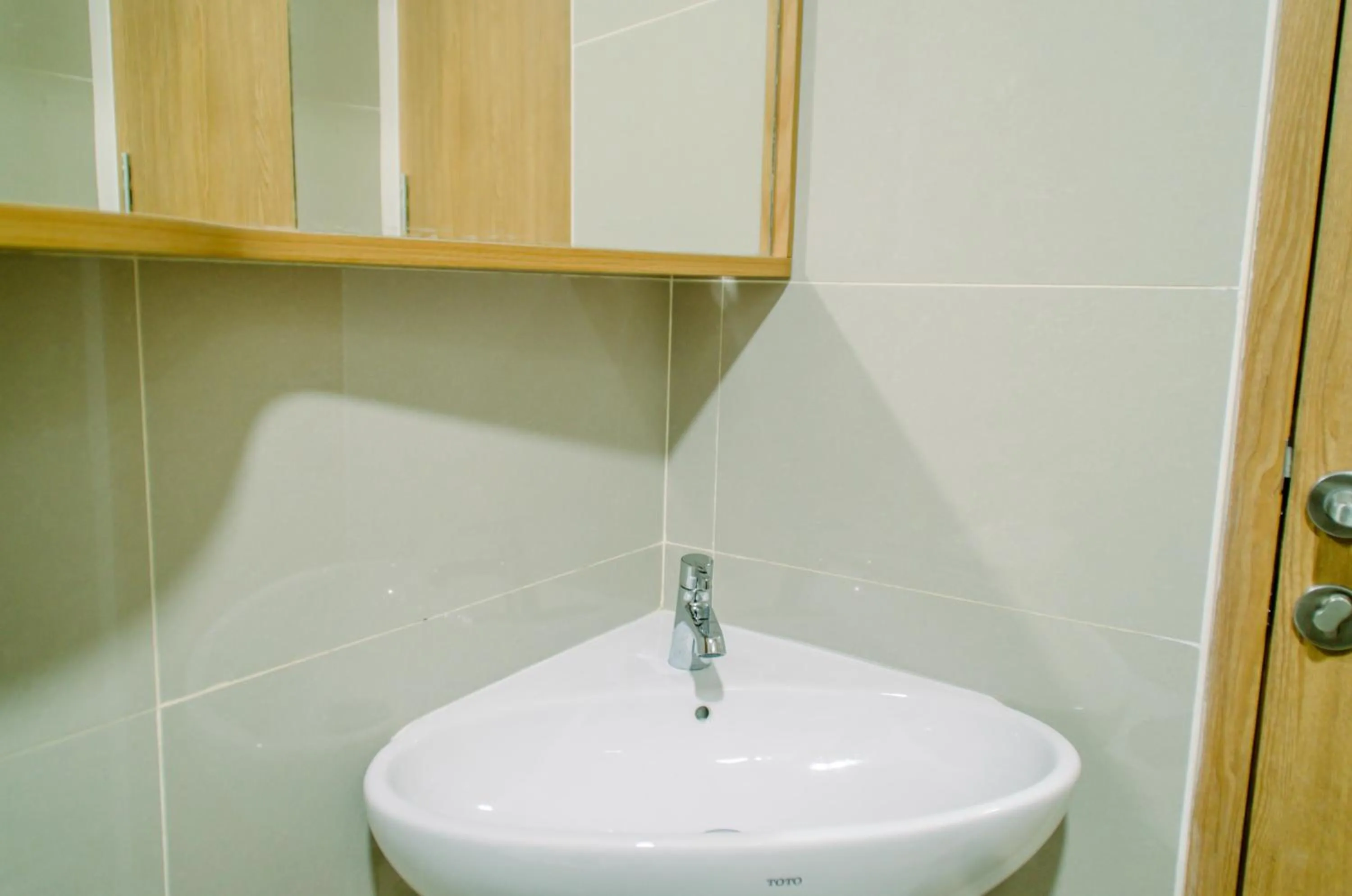 Bathroom in Cozy and Nice Studio at Apartment B Residence By Travelio
