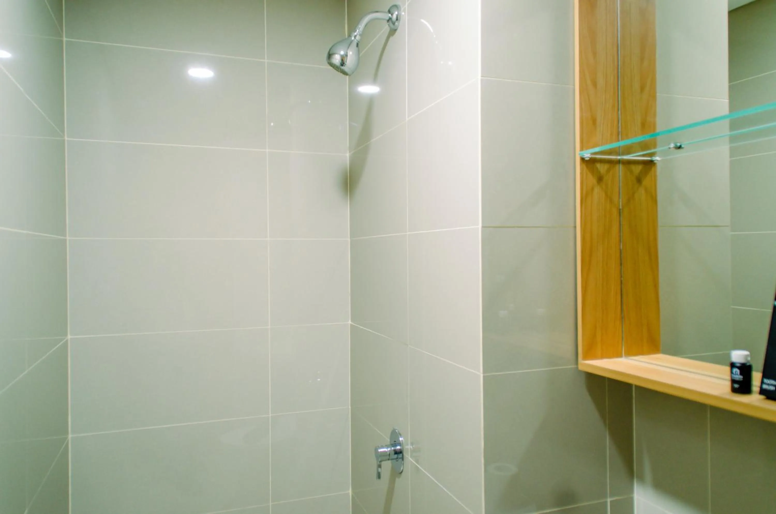 Bathroom in Cozy and Nice Studio at Apartment B Residence By Travelio