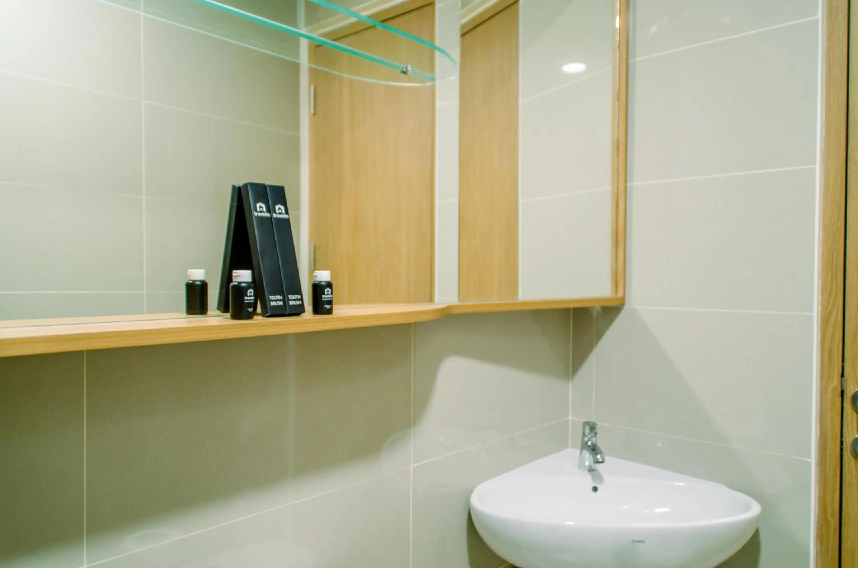 Bathroom in Cozy and Nice Studio at Apartment B Residence By Travelio