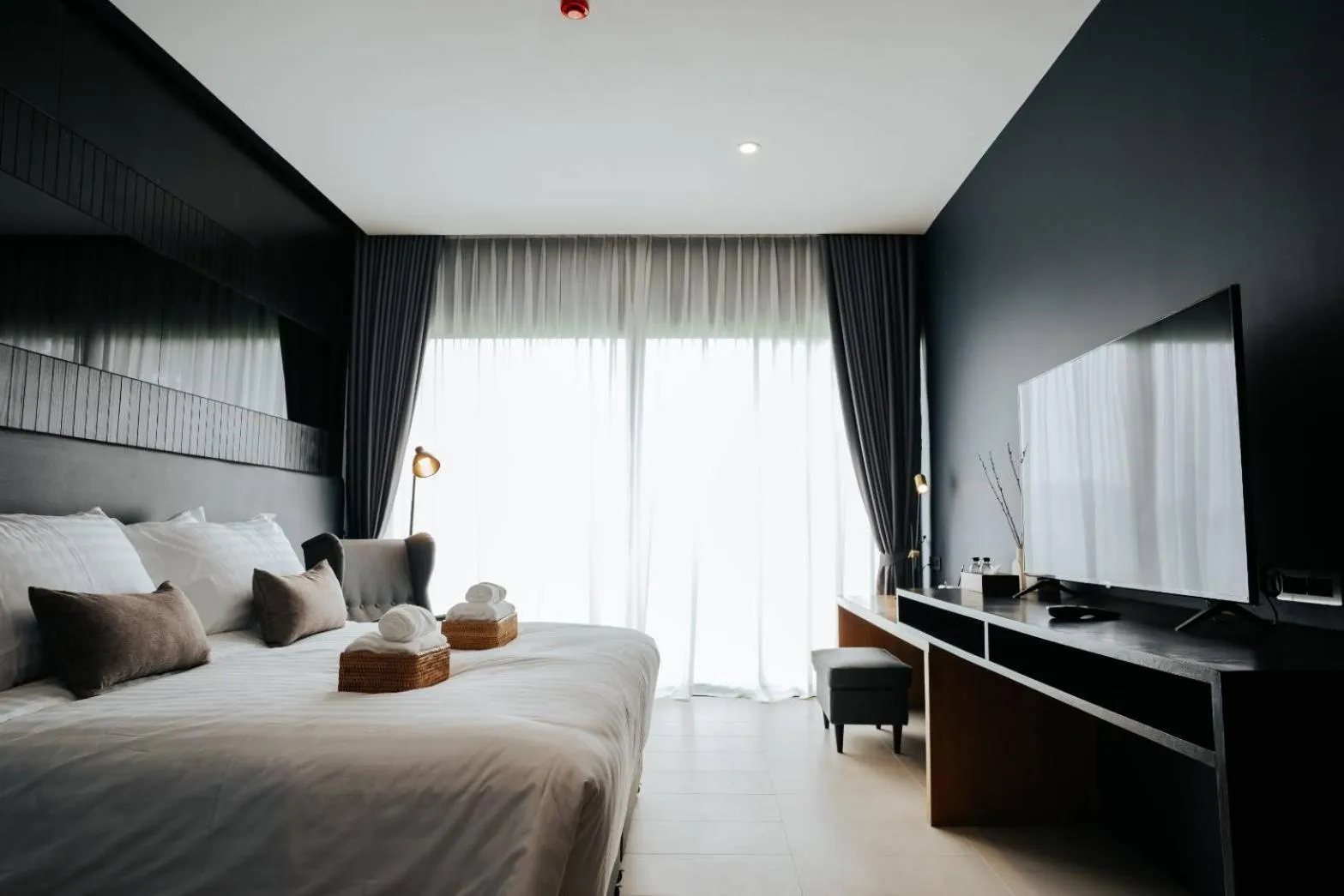 Bed in The Grandiose Hotel Chiang Rai เดอะแกรนด์ดิโอสเชียงราย