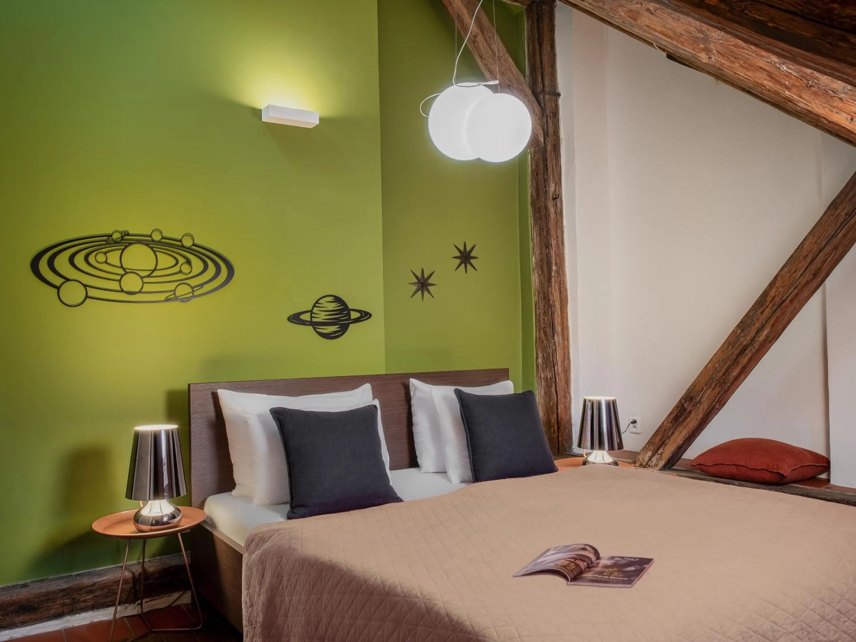 Bed in 4 Arts Apartments by Adrez