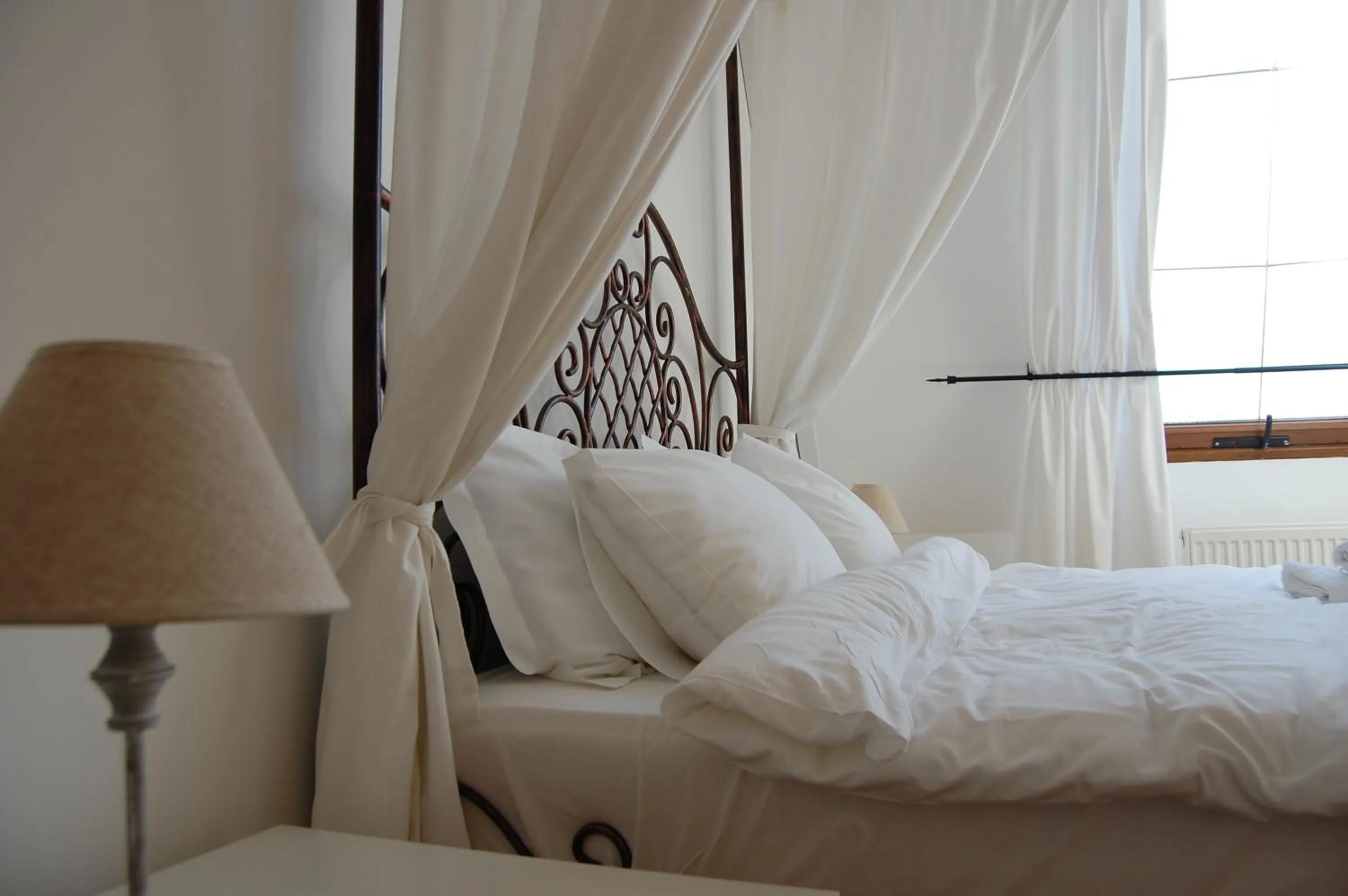 Decorative detail, Bed in Bucharest Boutique Accommodation by Hotels