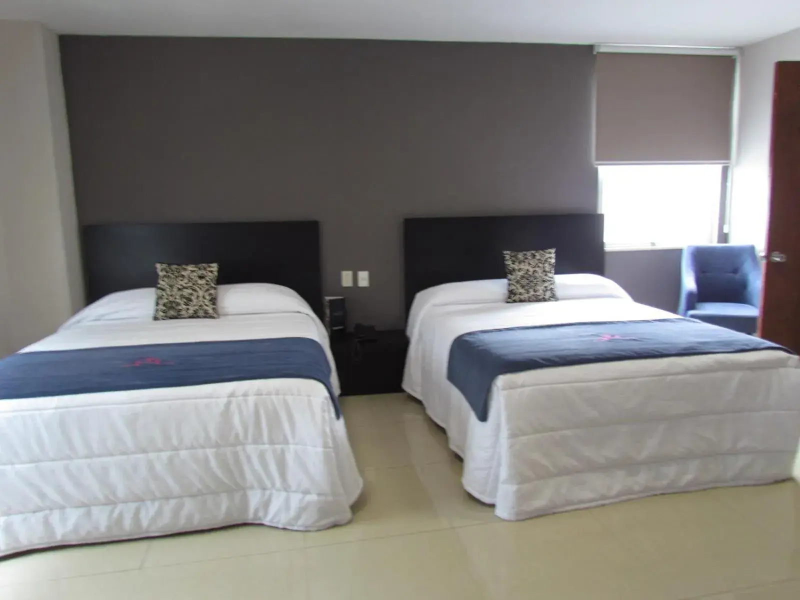 Photo of the whole room, Bed in Hotel HAUS Express Photo of the whole room, Bed in Hotel HAUS Express