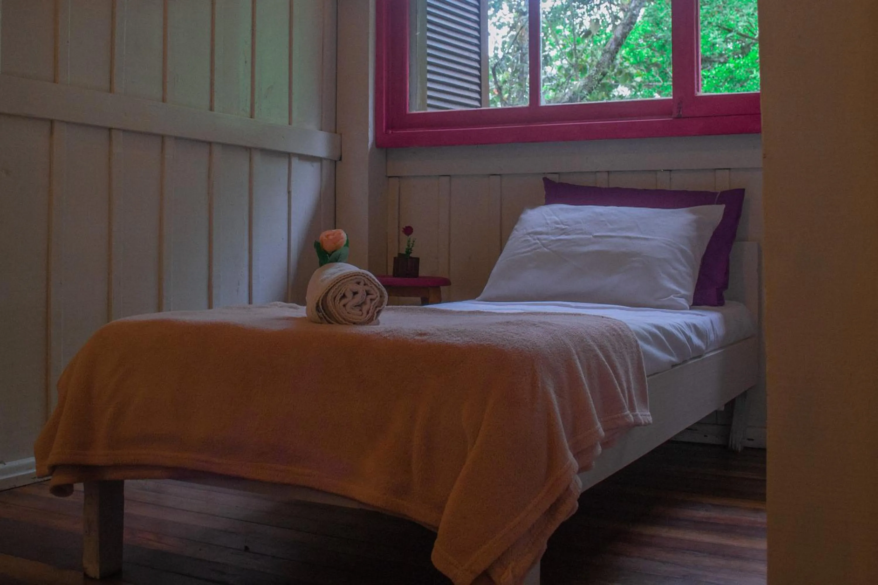 Bed in Pousada Rosa