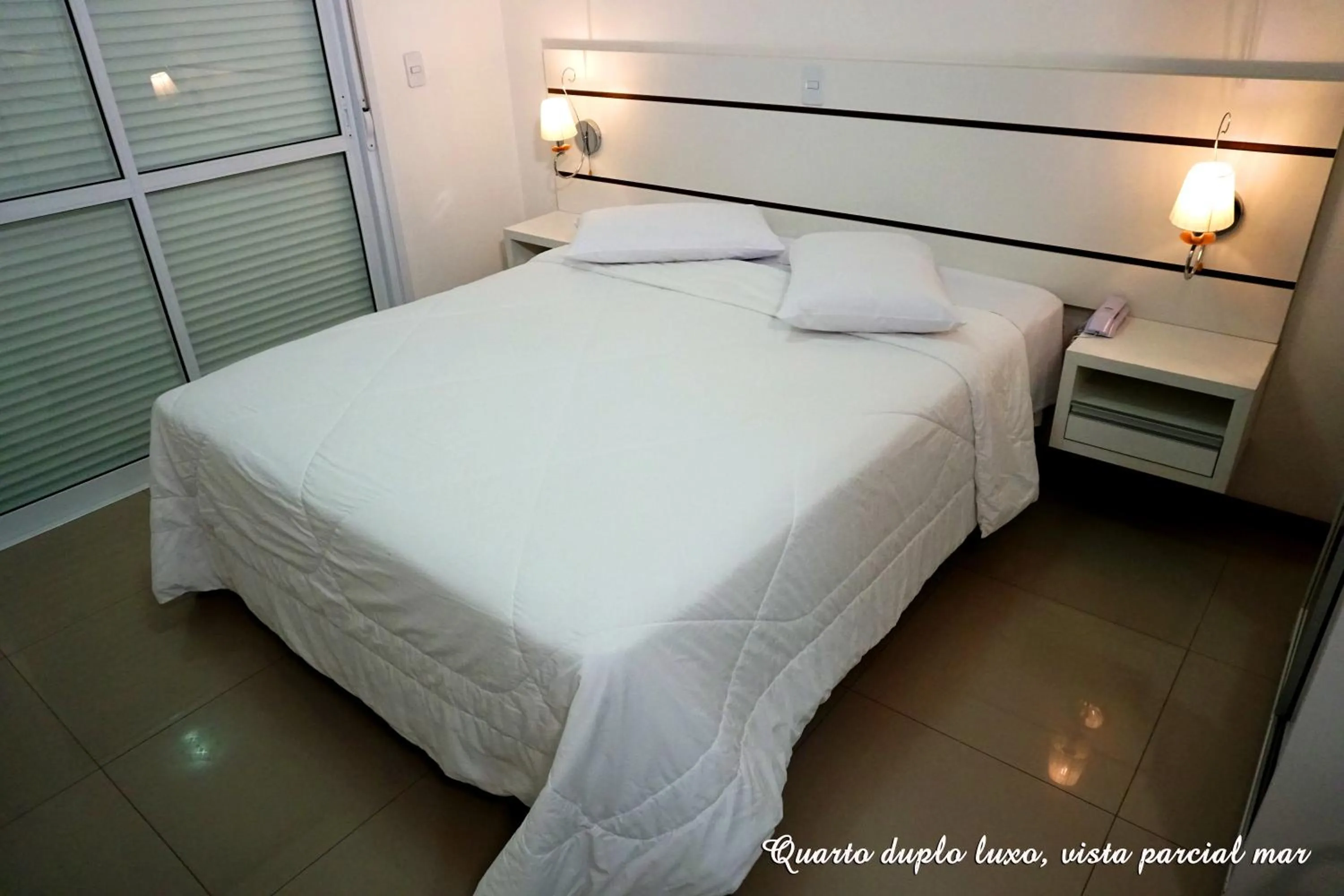 Bed in Pousada Molhes da Barra