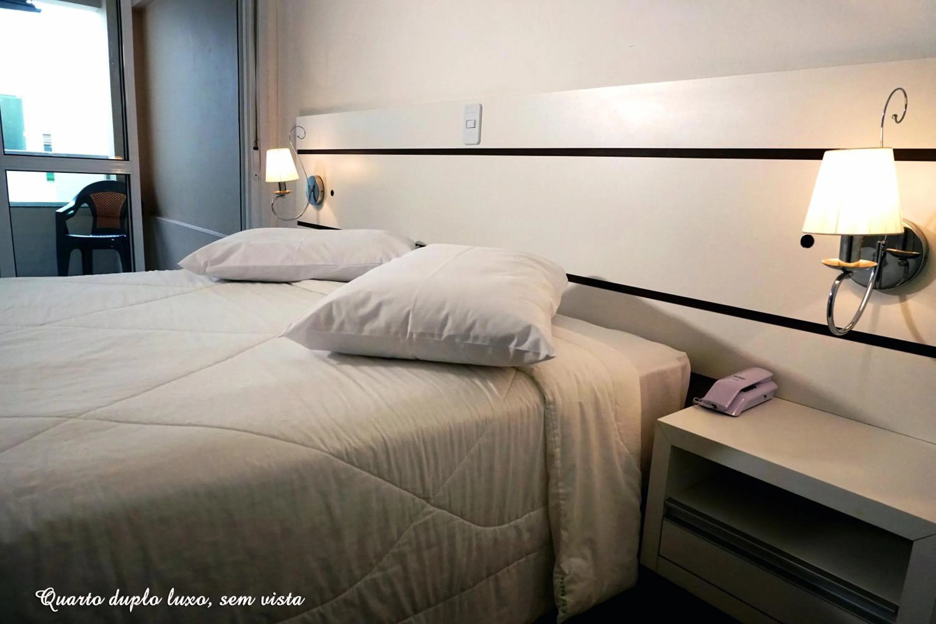 Bed in Pousada Molhes da Barra