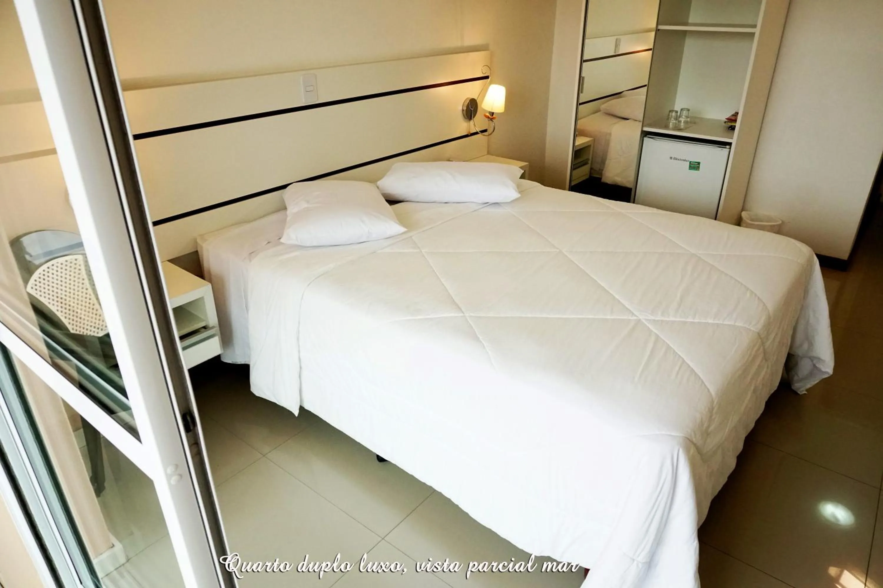 Bed in Pousada Molhes da Barra