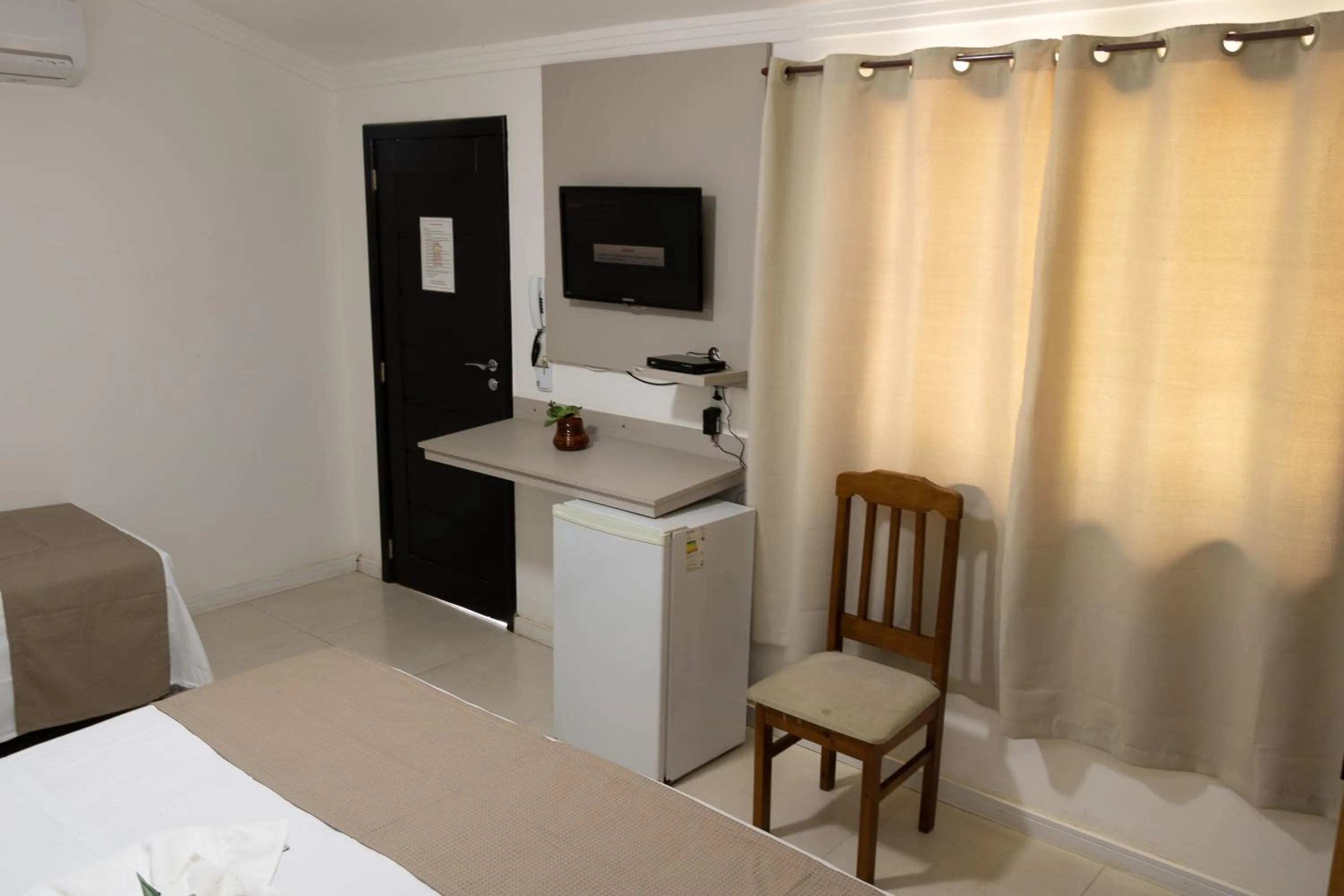 Bed in Pousada Kactus