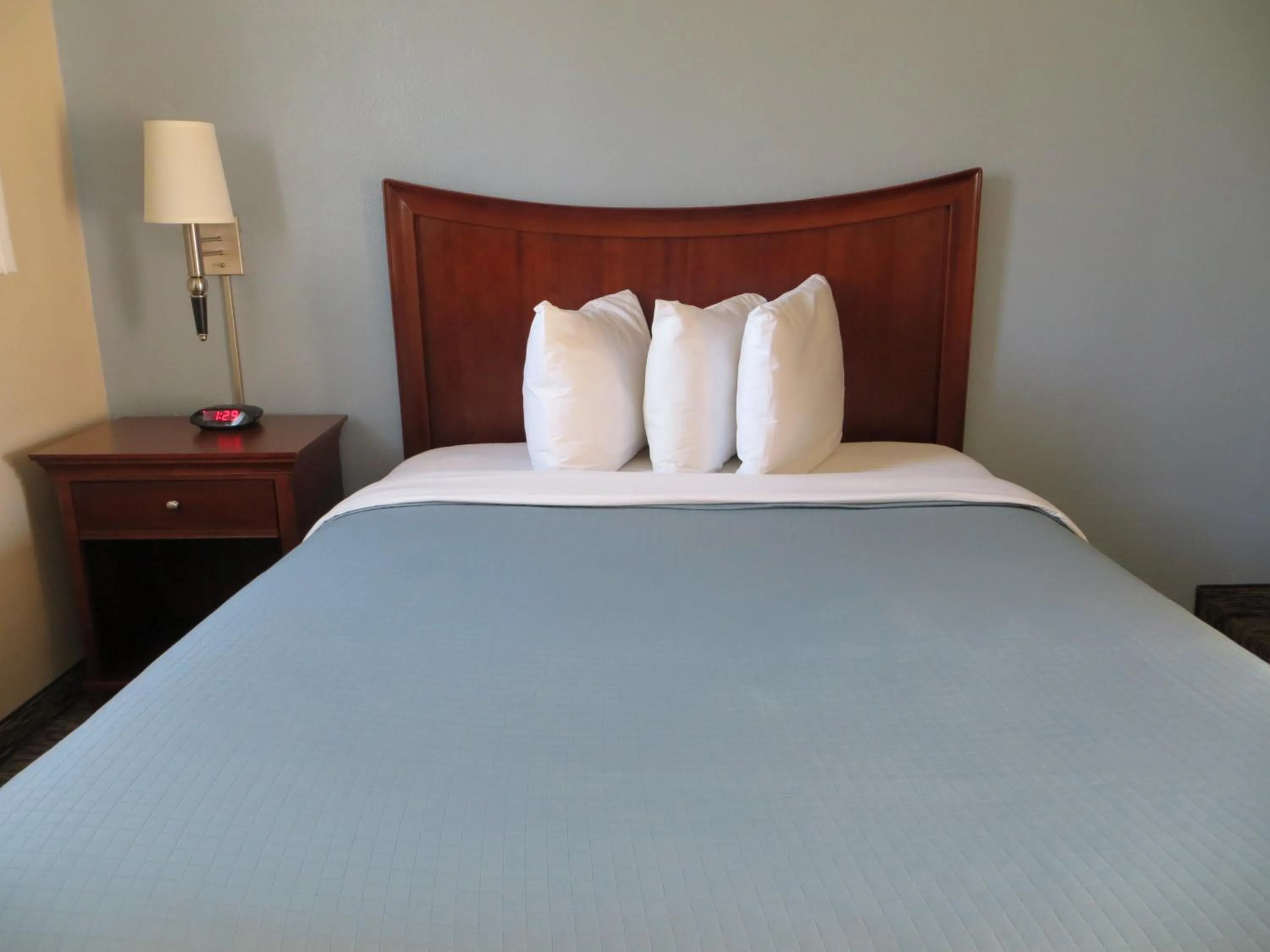 Bed in Coronet Motel