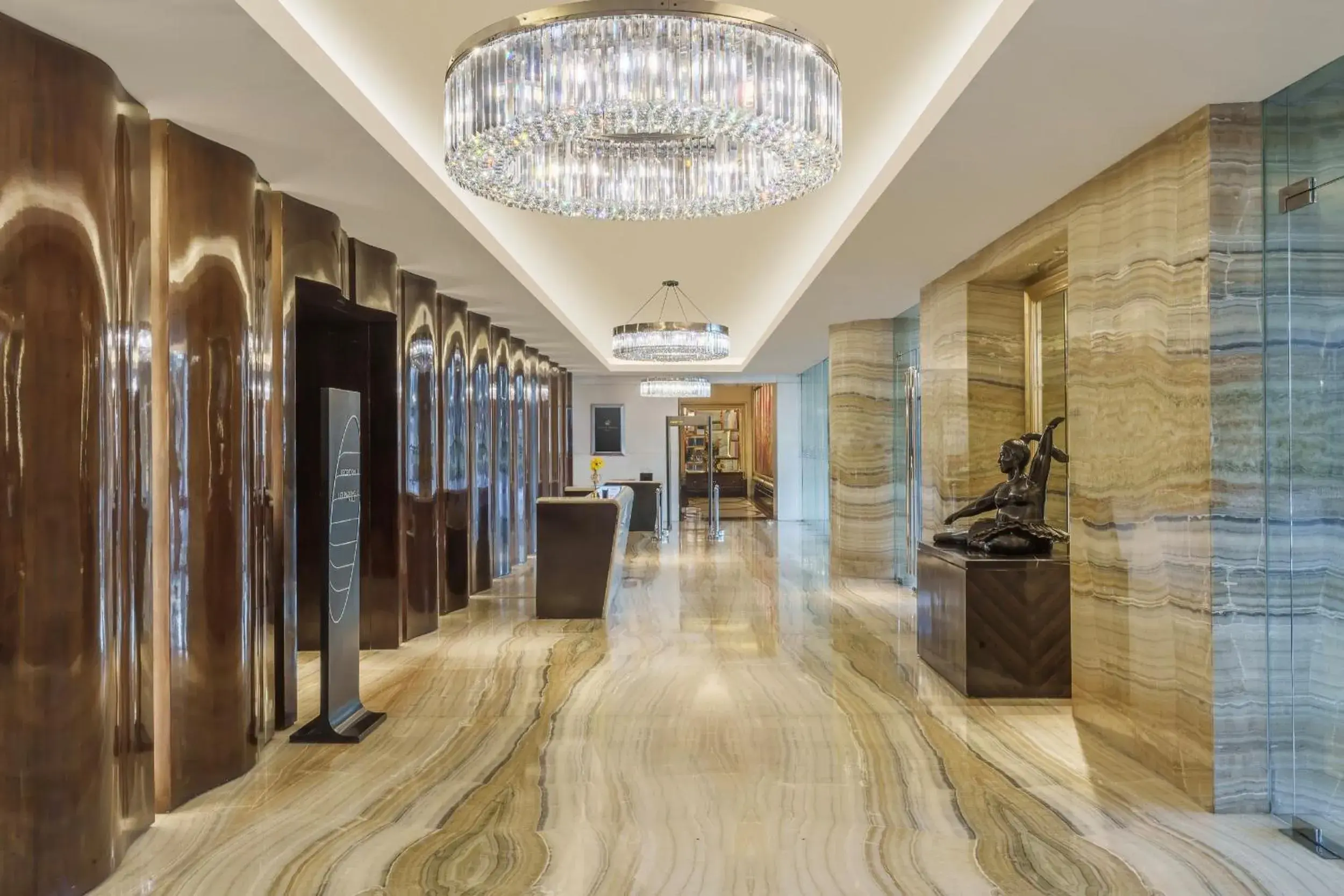 Lobby or reception in Hotel Ciputra World Surabaya managed by Swiss-Belhotel International Lobby or reception in Hotel Ciputra World Surabaya managed by Swiss-Belhotel International