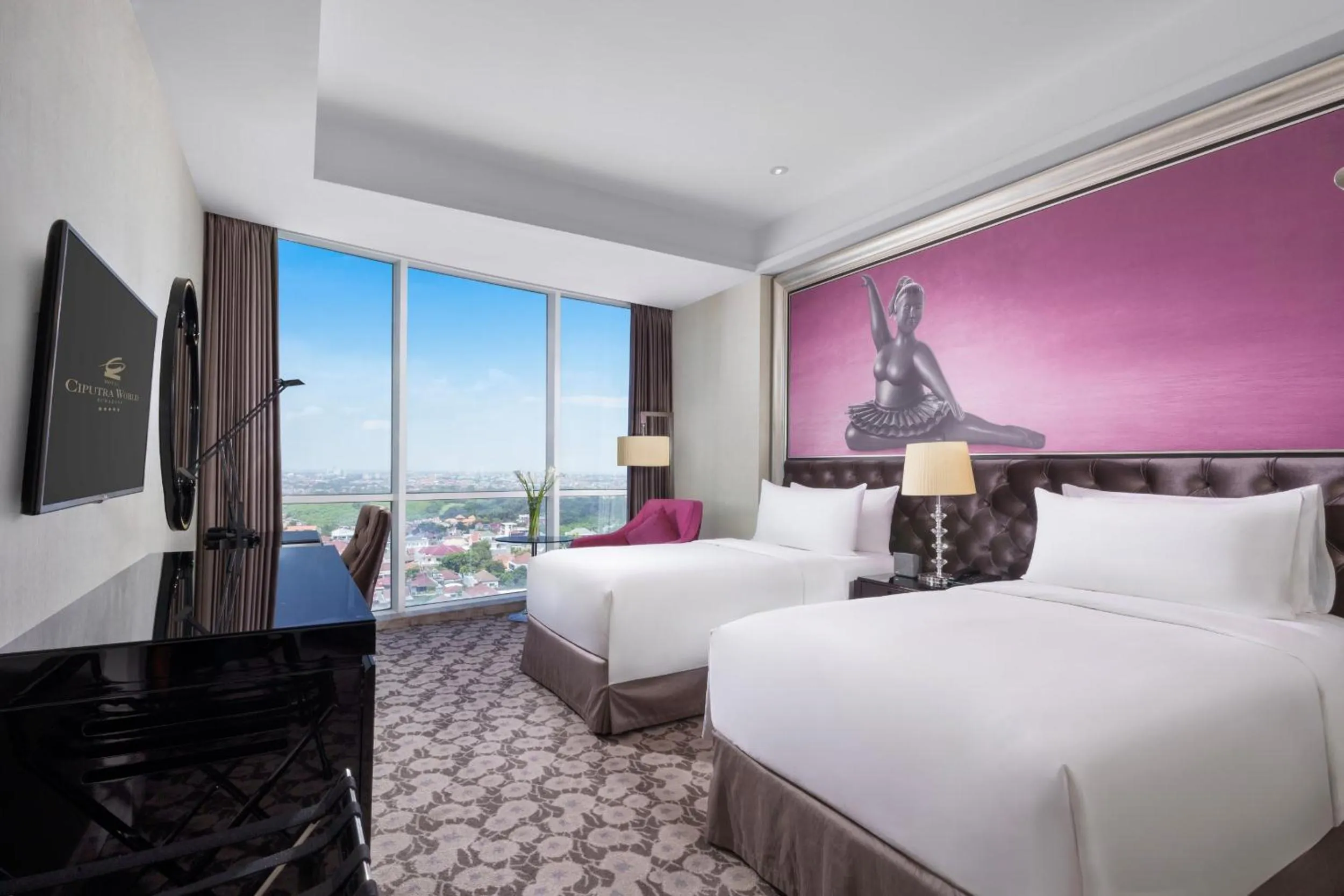 Bed in Hotel Ciputra World Surabaya managed by Swiss-Belhotel International