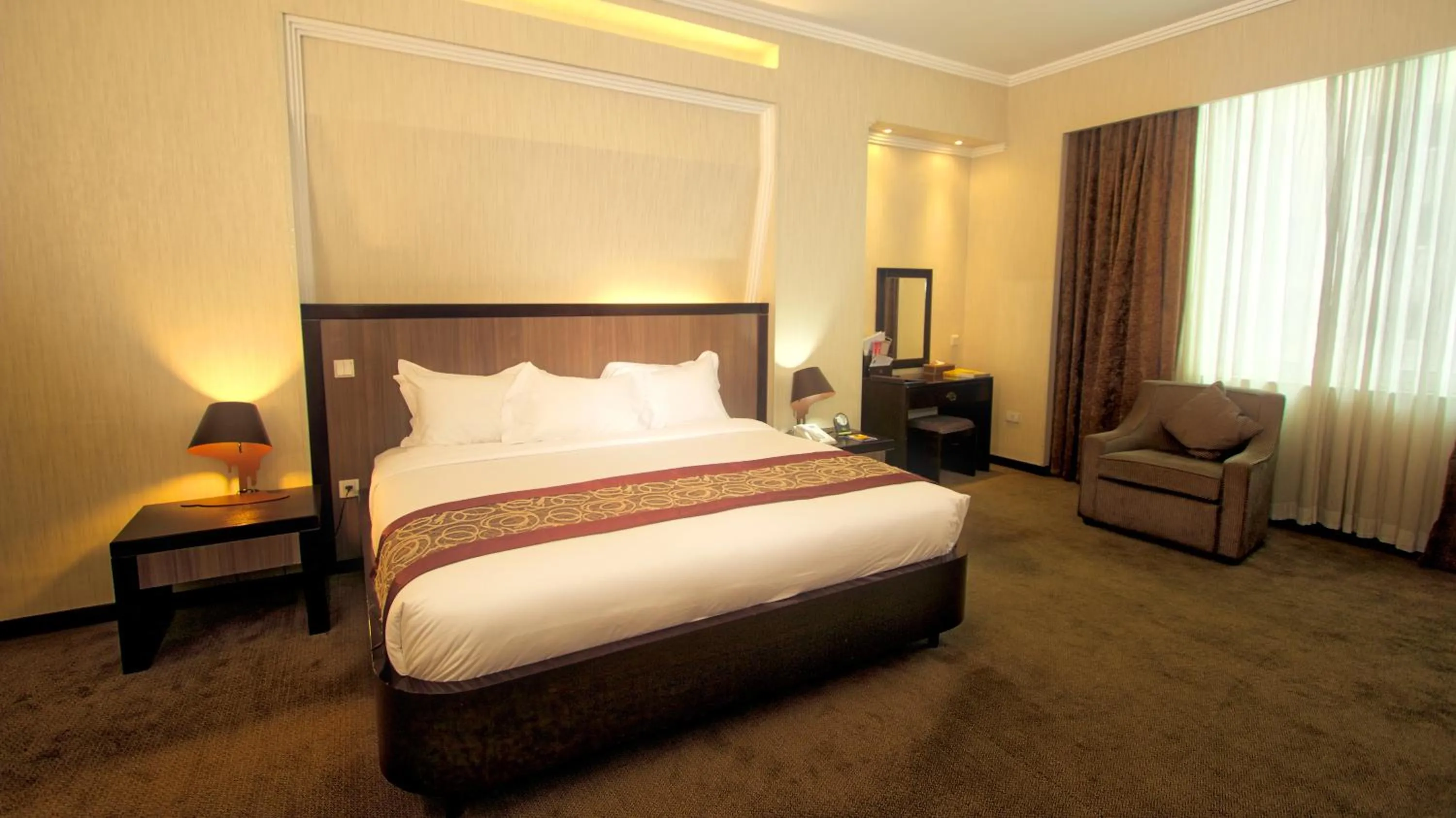 Bed in Elilly International Hotel