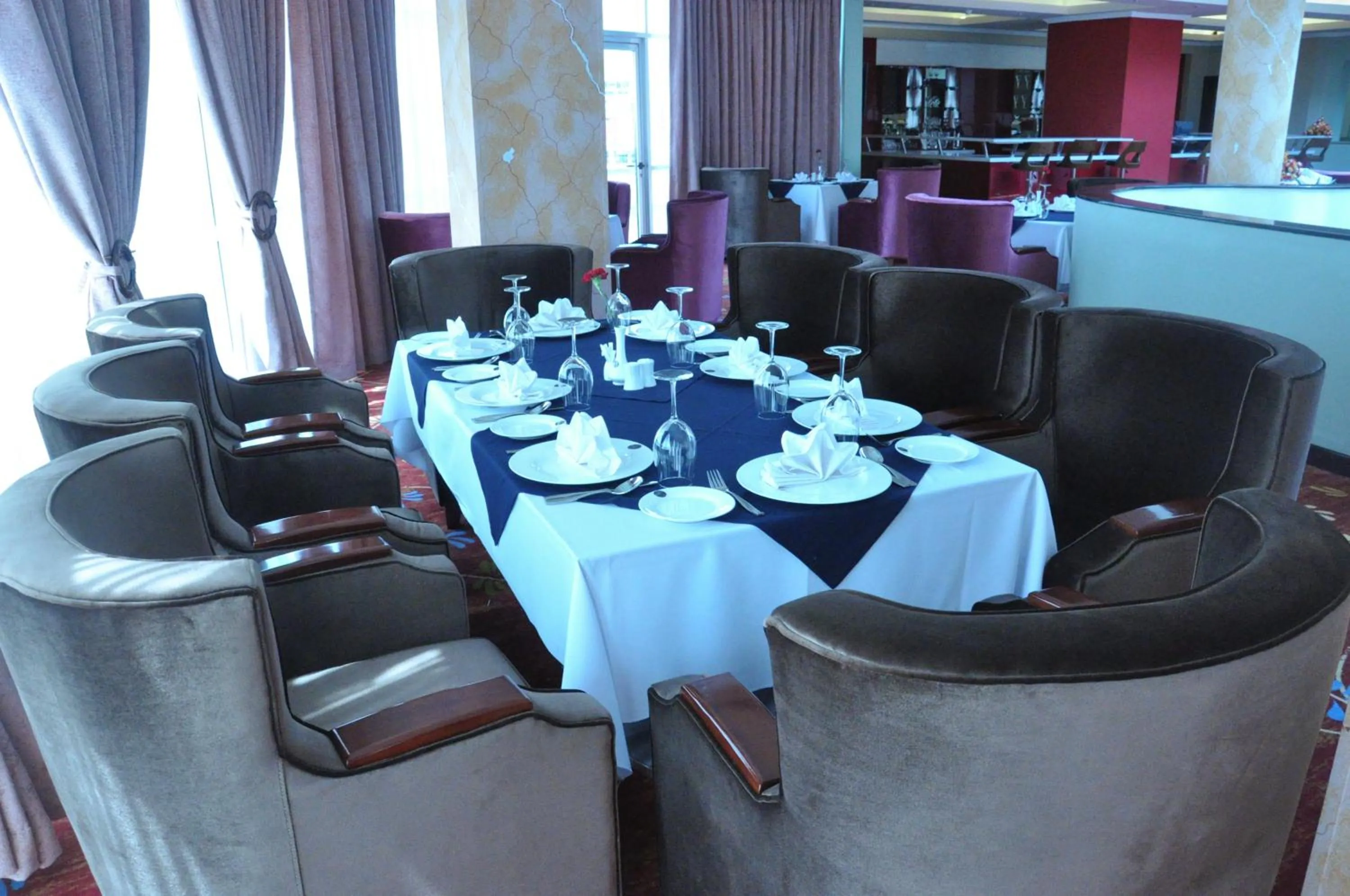 Dining area in Elilly International Hotel