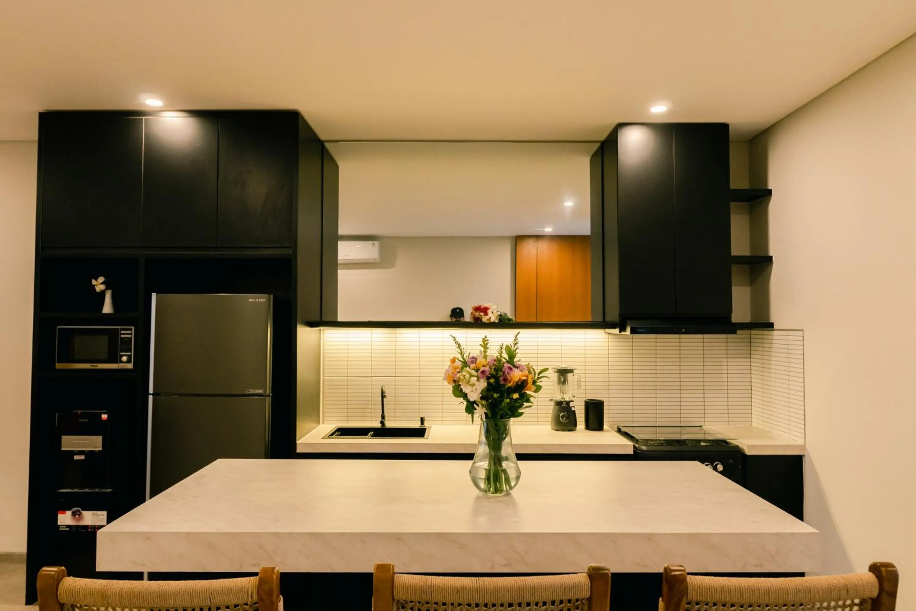 Kitchen or kitchenette in The Menuai Bali Villas Canggu