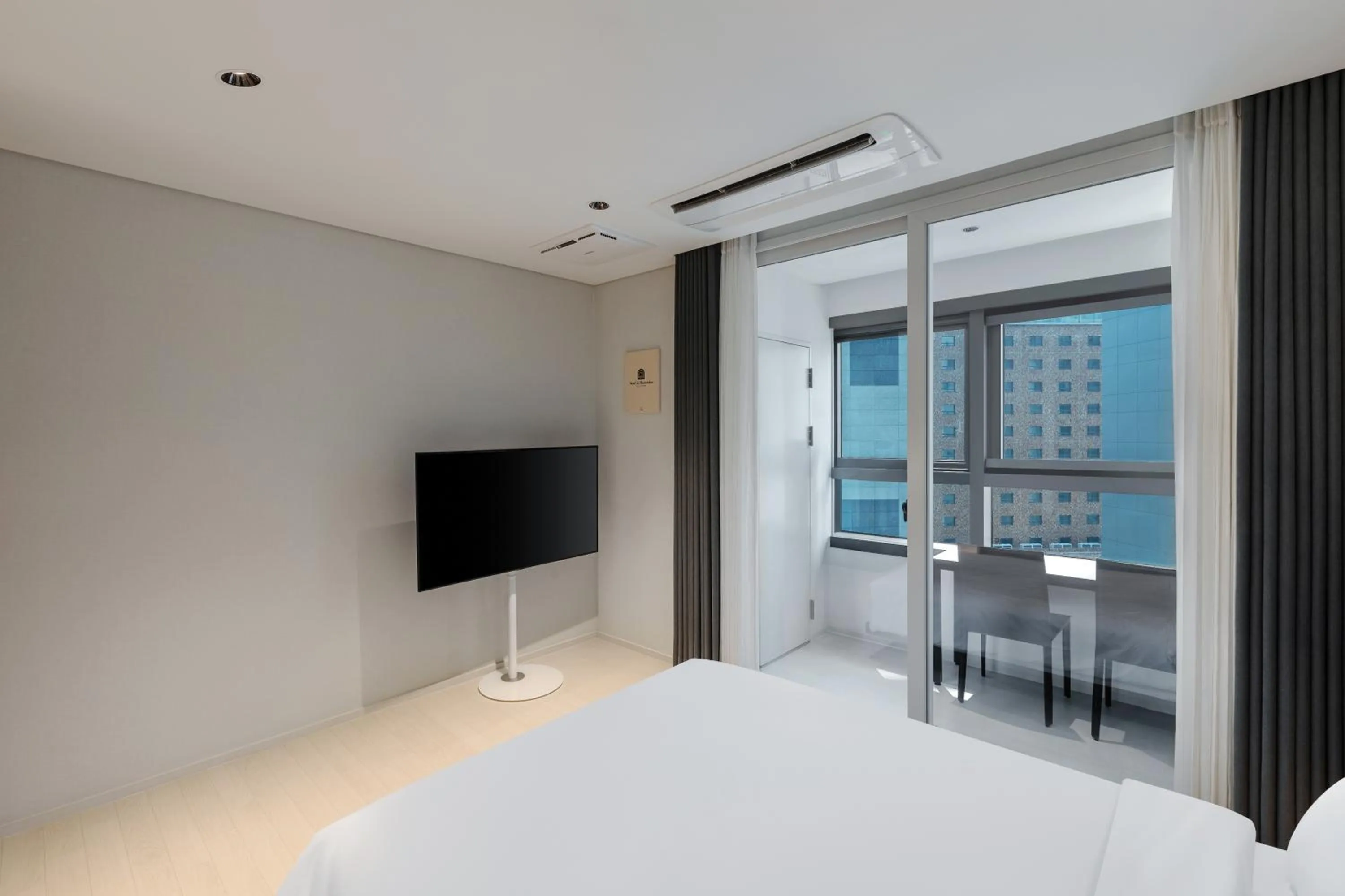 Bedroom, Bed in NewCZ Haeundae Residence