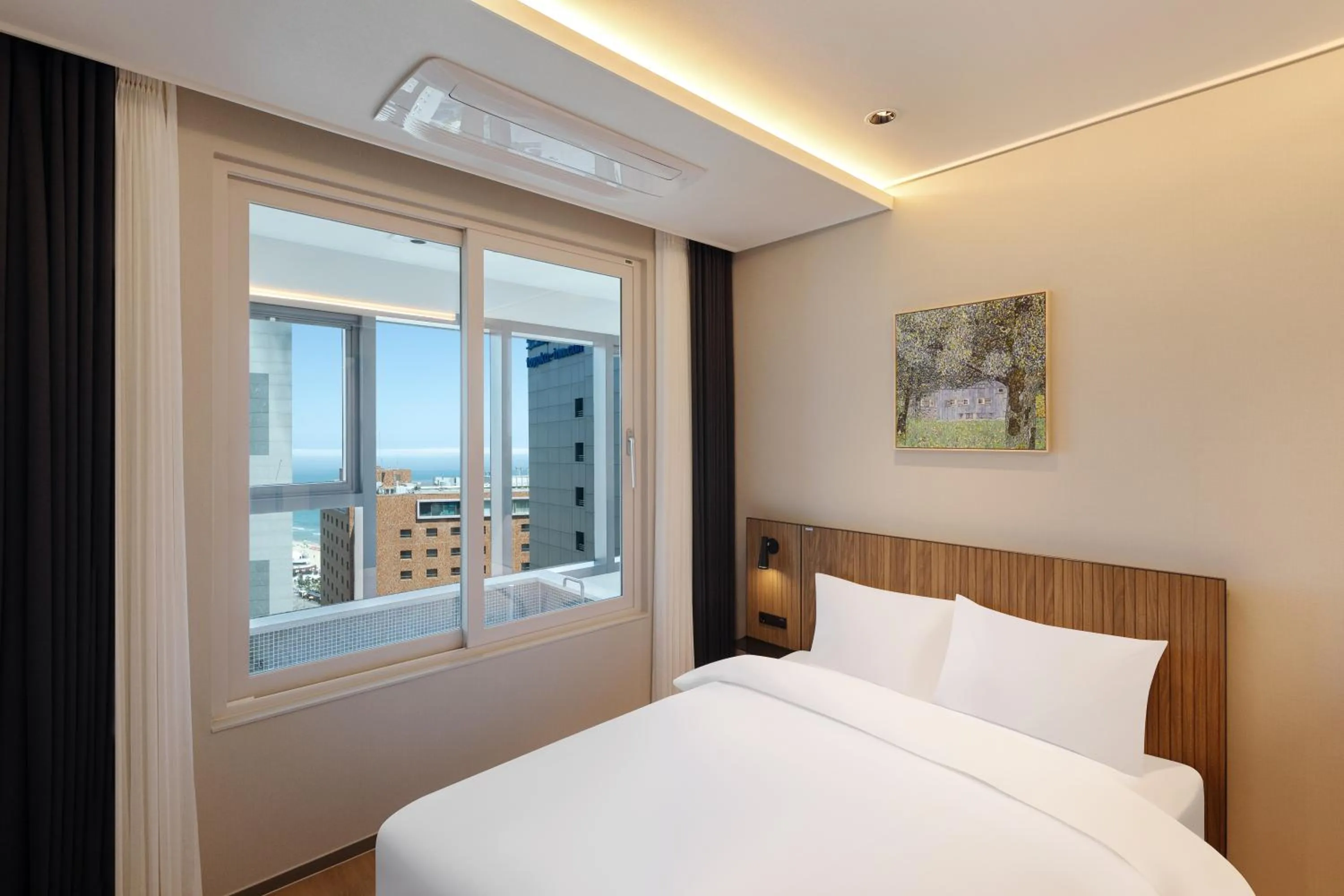 Bedroom, Bed in NewCZ Haeundae Residence