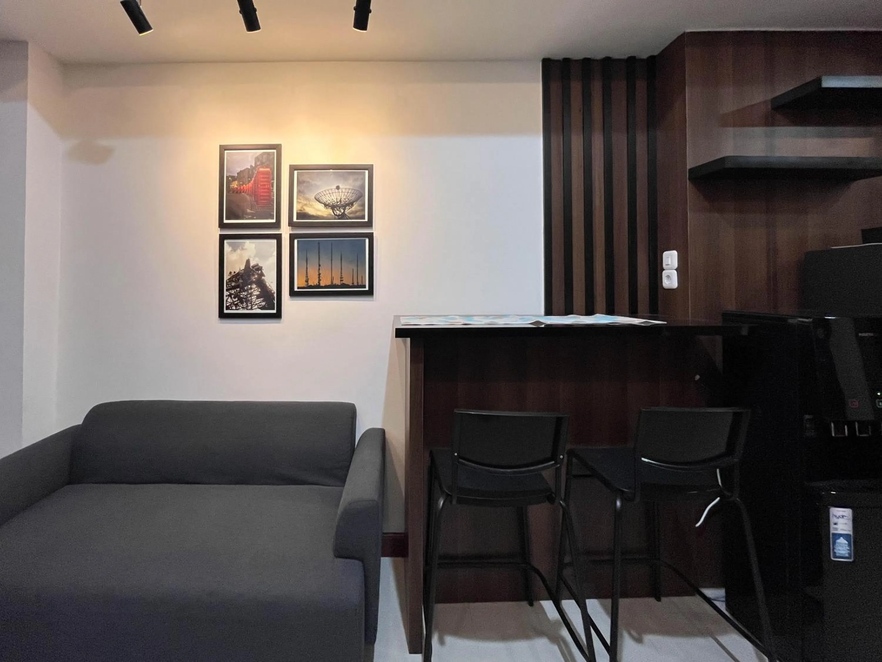 Living room in Warm and Cozy 2BR Vida View Makassar Apartment By Travelio