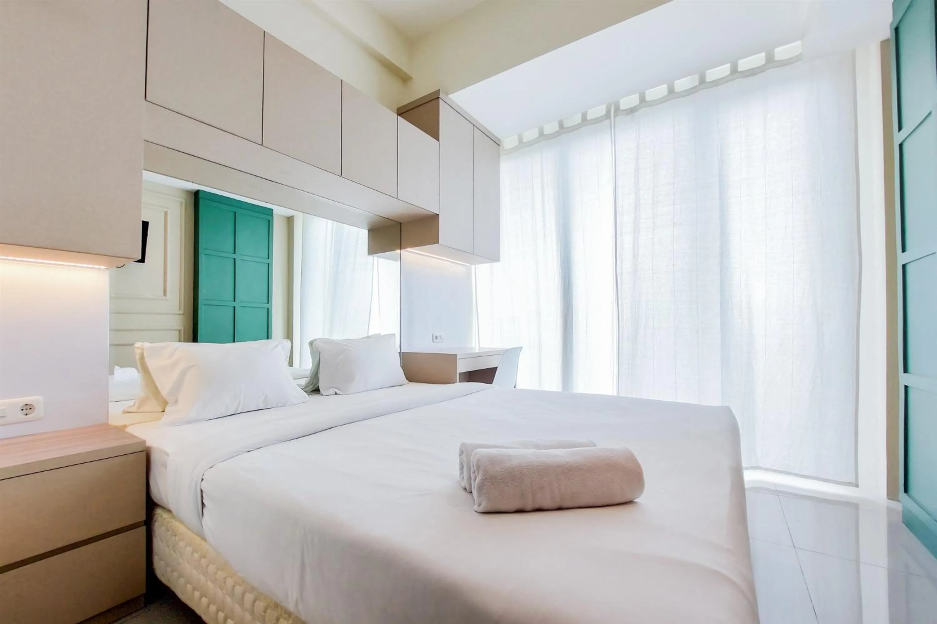 Cozy Stay Studio at Tree Park City BSD Apartment By Travelio