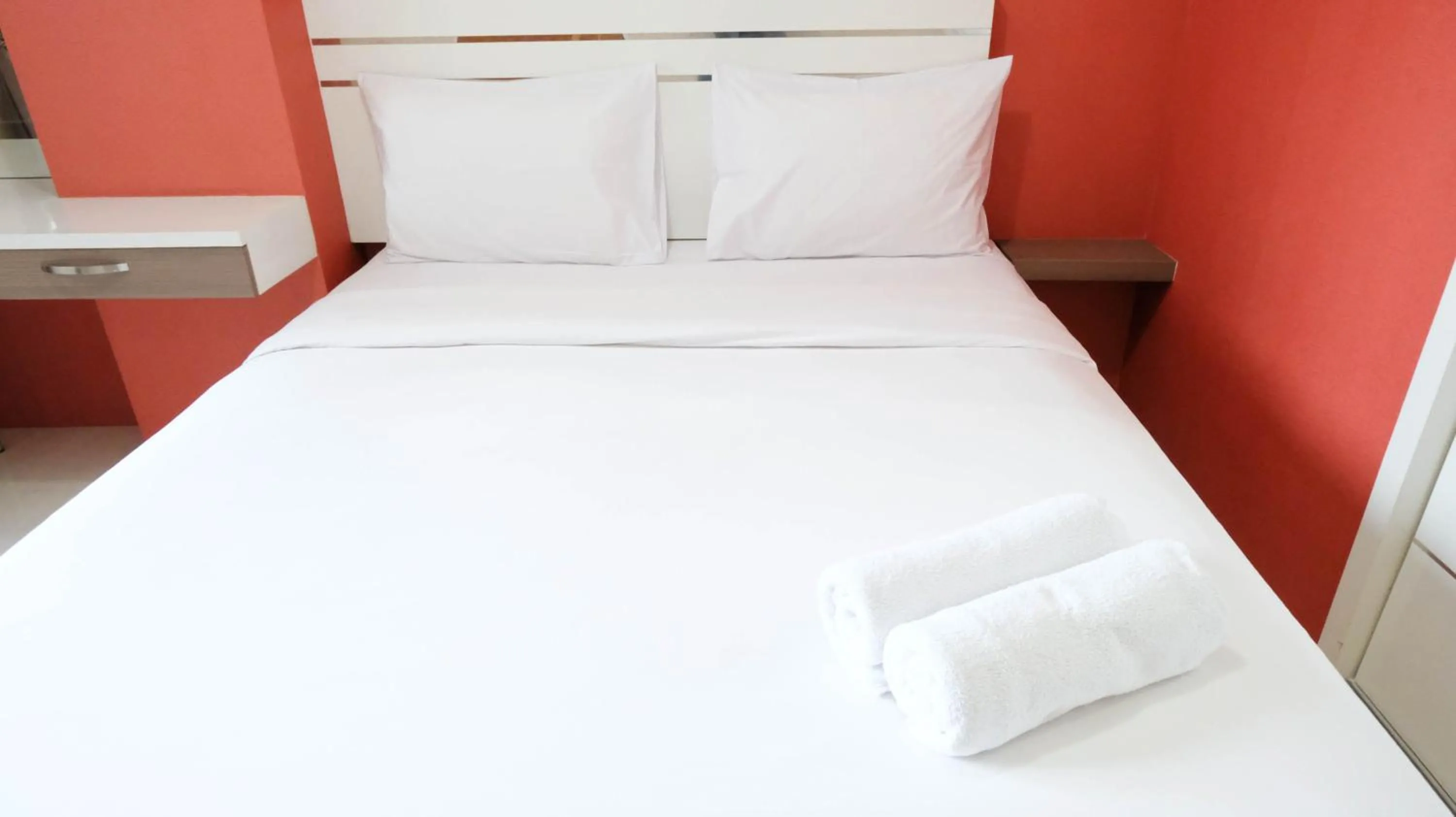 Bedroom, Bed in Homey 2BR at Puncak Bukit Golf Surabaya Apartment By Travelio