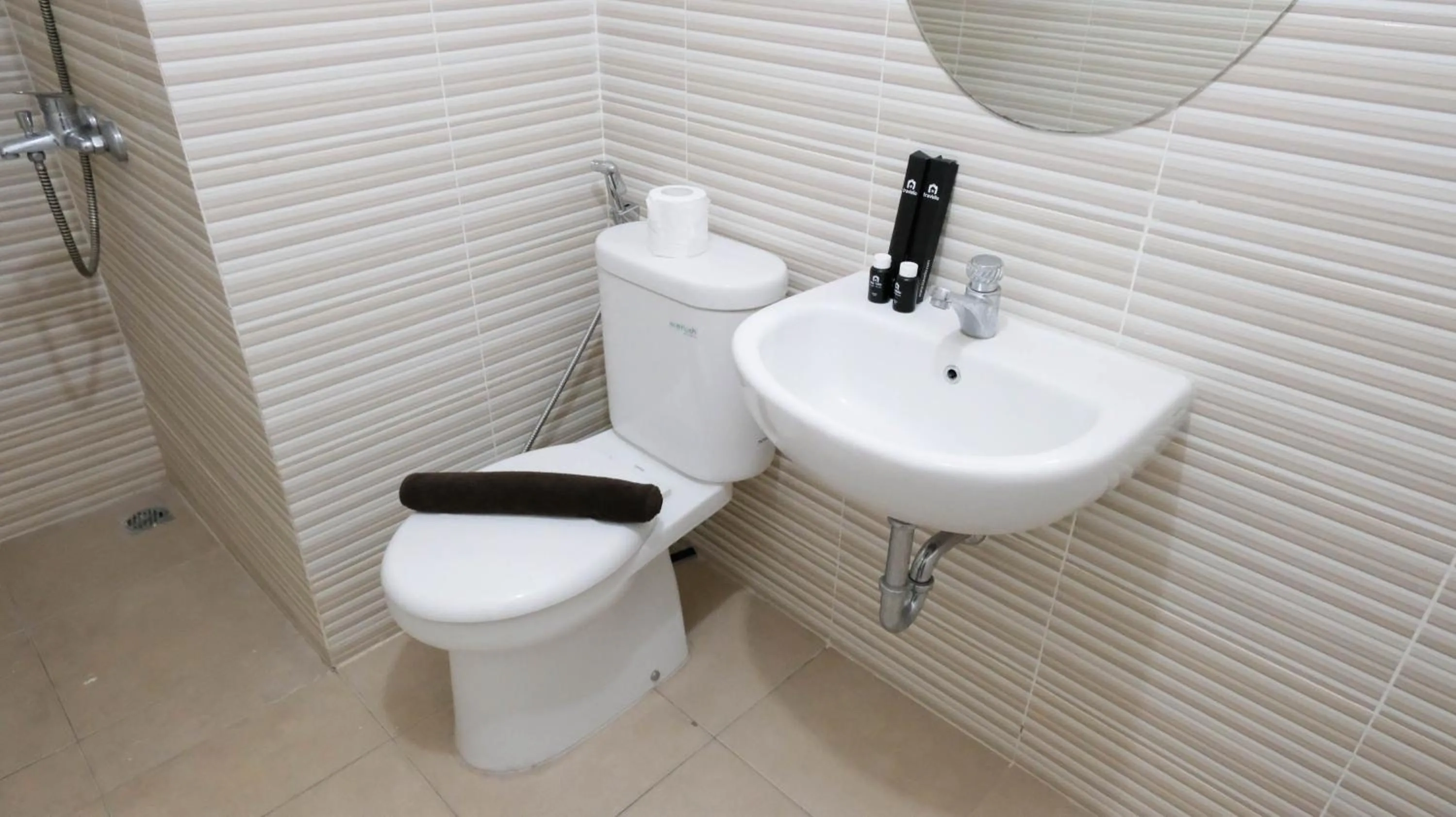 Homey 2BR at Puncak Bukit Golf Surabaya Apartment By Travelio