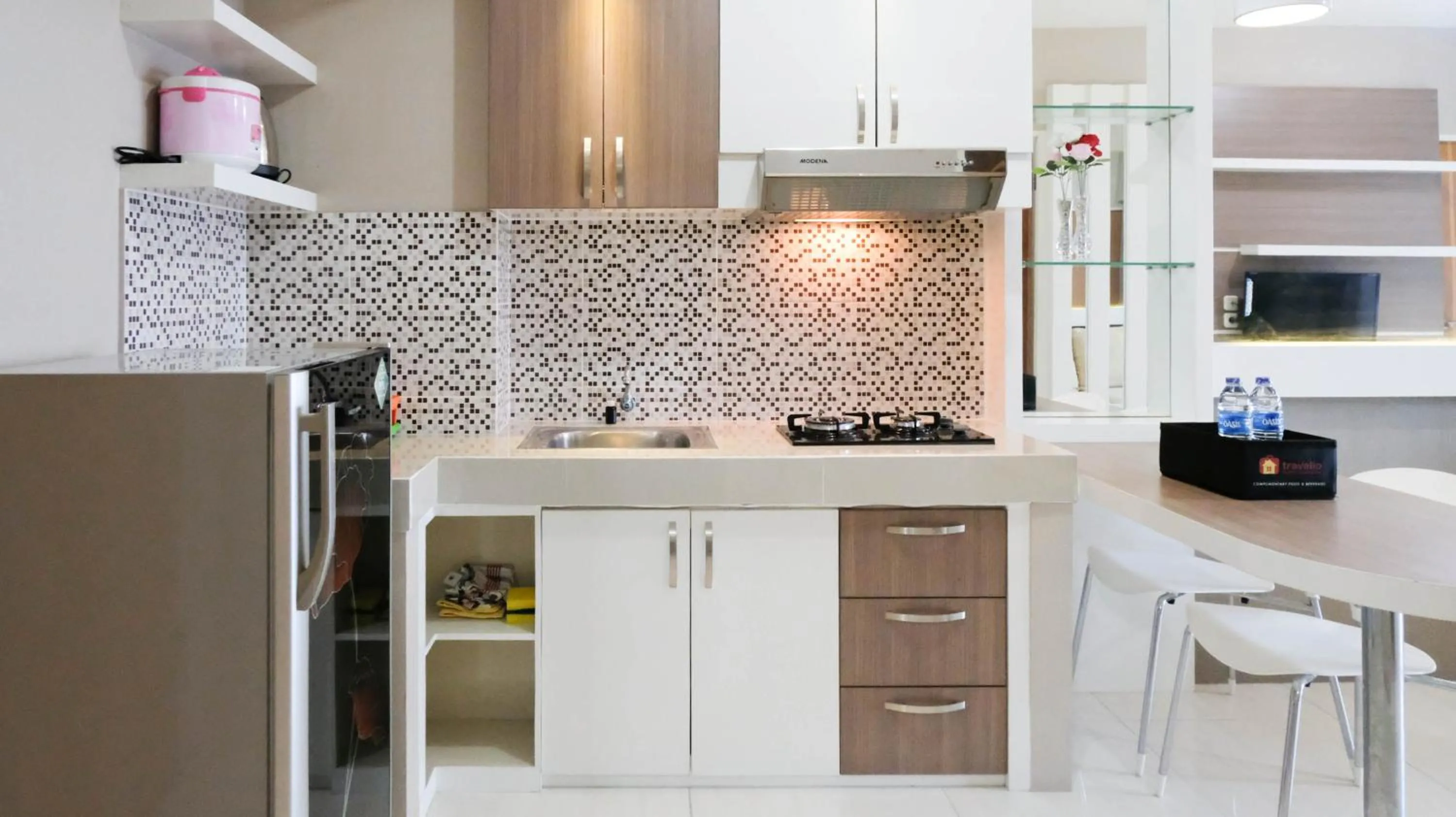 Homey 2BR at Puncak Bukit Golf Surabaya Apartment By Travelio