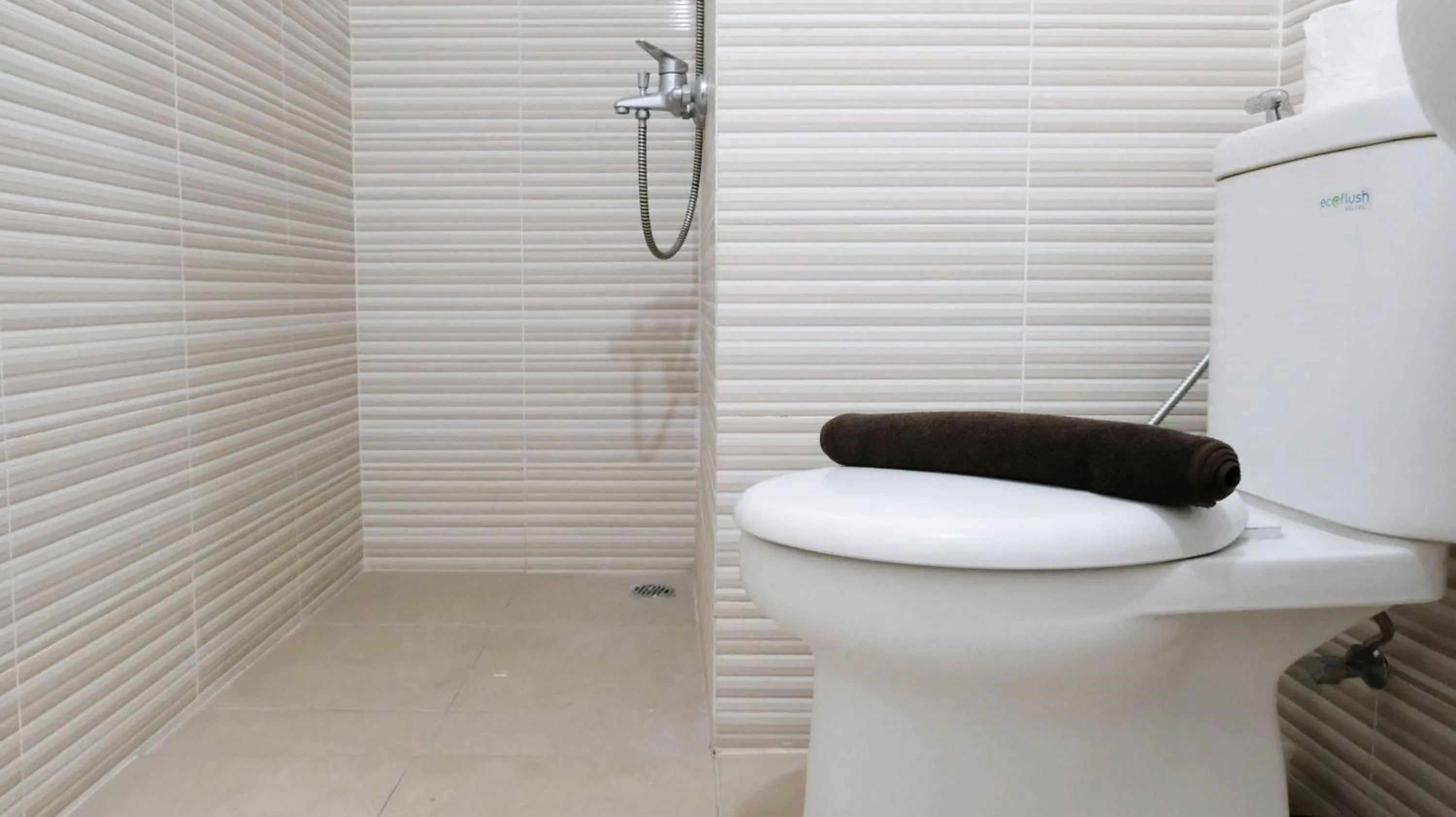 Homey 2BR at Puncak Bukit Golf Surabaya Apartment By Travelio