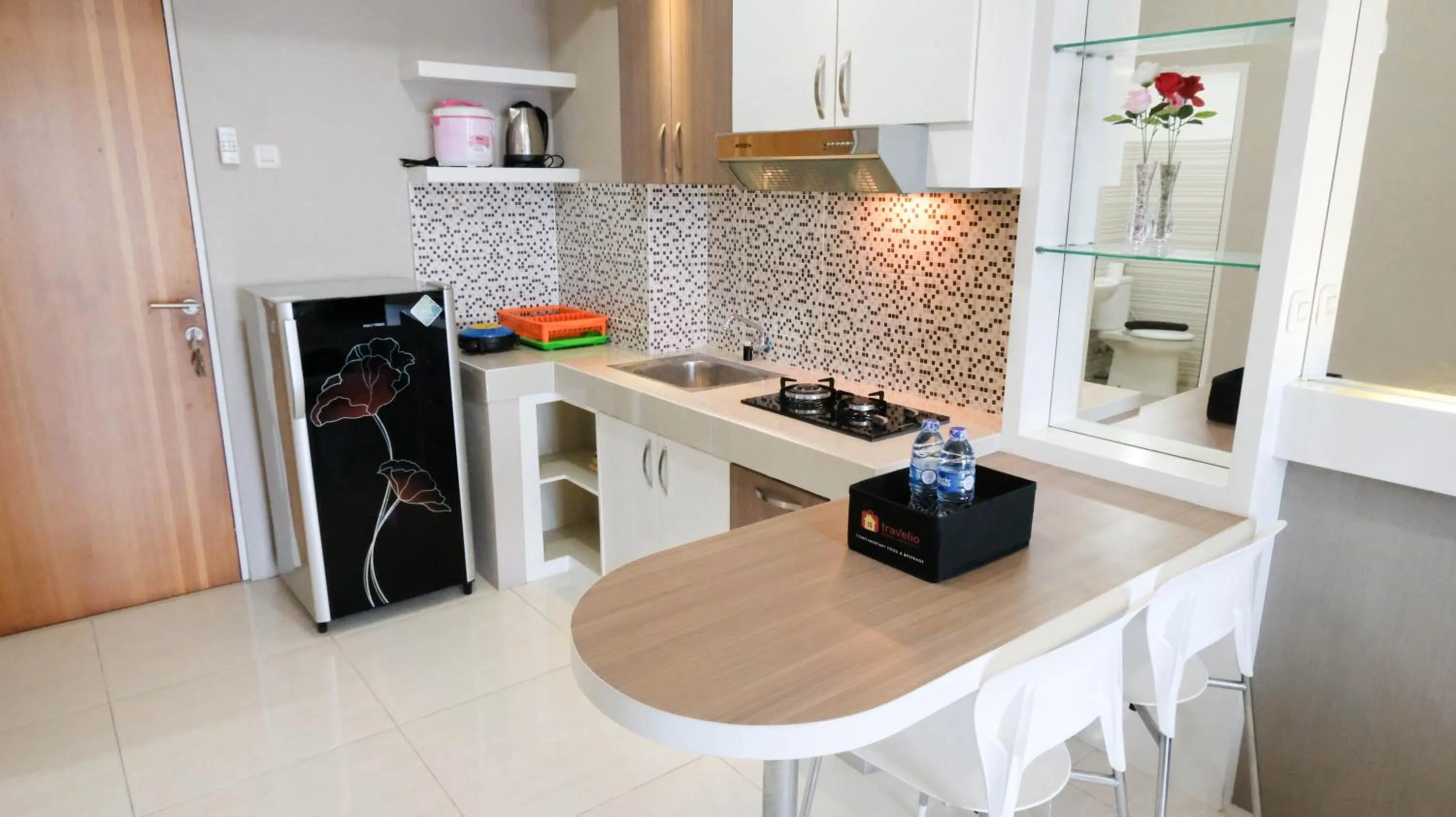 Homey 2BR at Puncak Bukit Golf Surabaya Apartment By Travelio