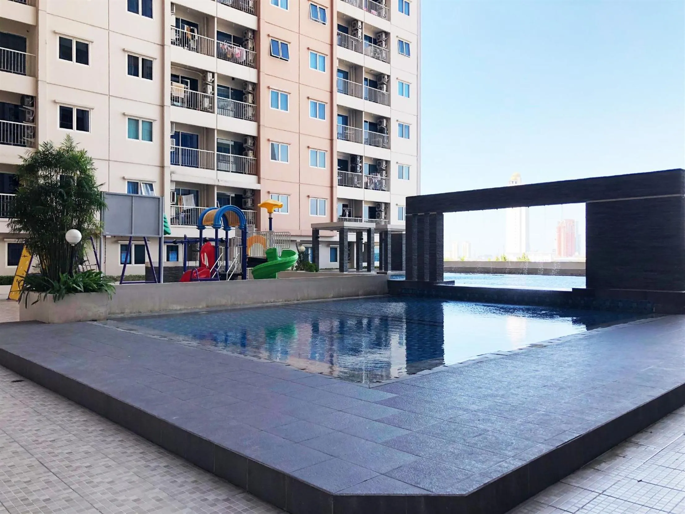 Homey 2BR at Puncak Bukit Golf Surabaya Apartment By Travelio