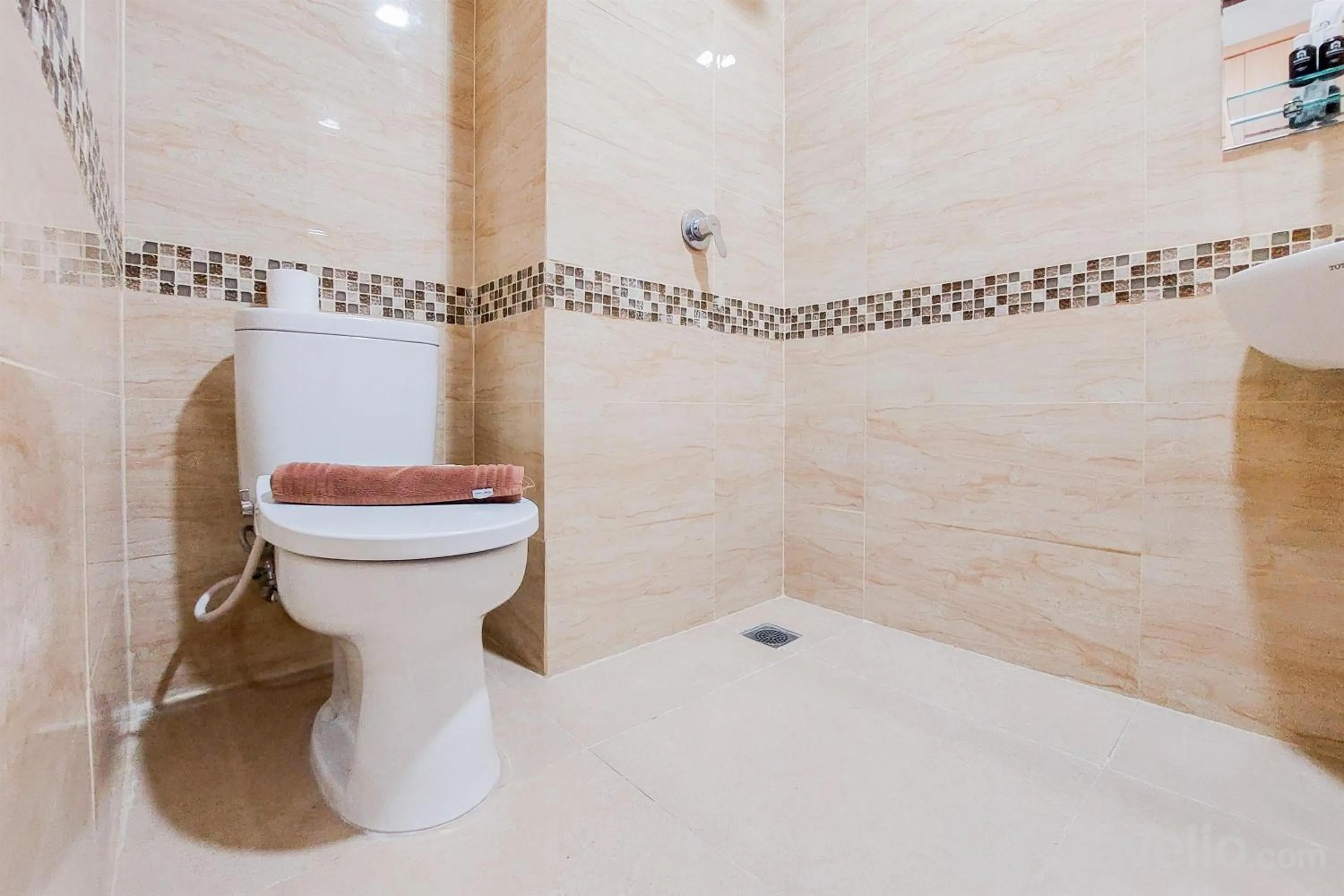 Bathroom in Warm and Simply Look Studio Apartment at B Residence By Travelio