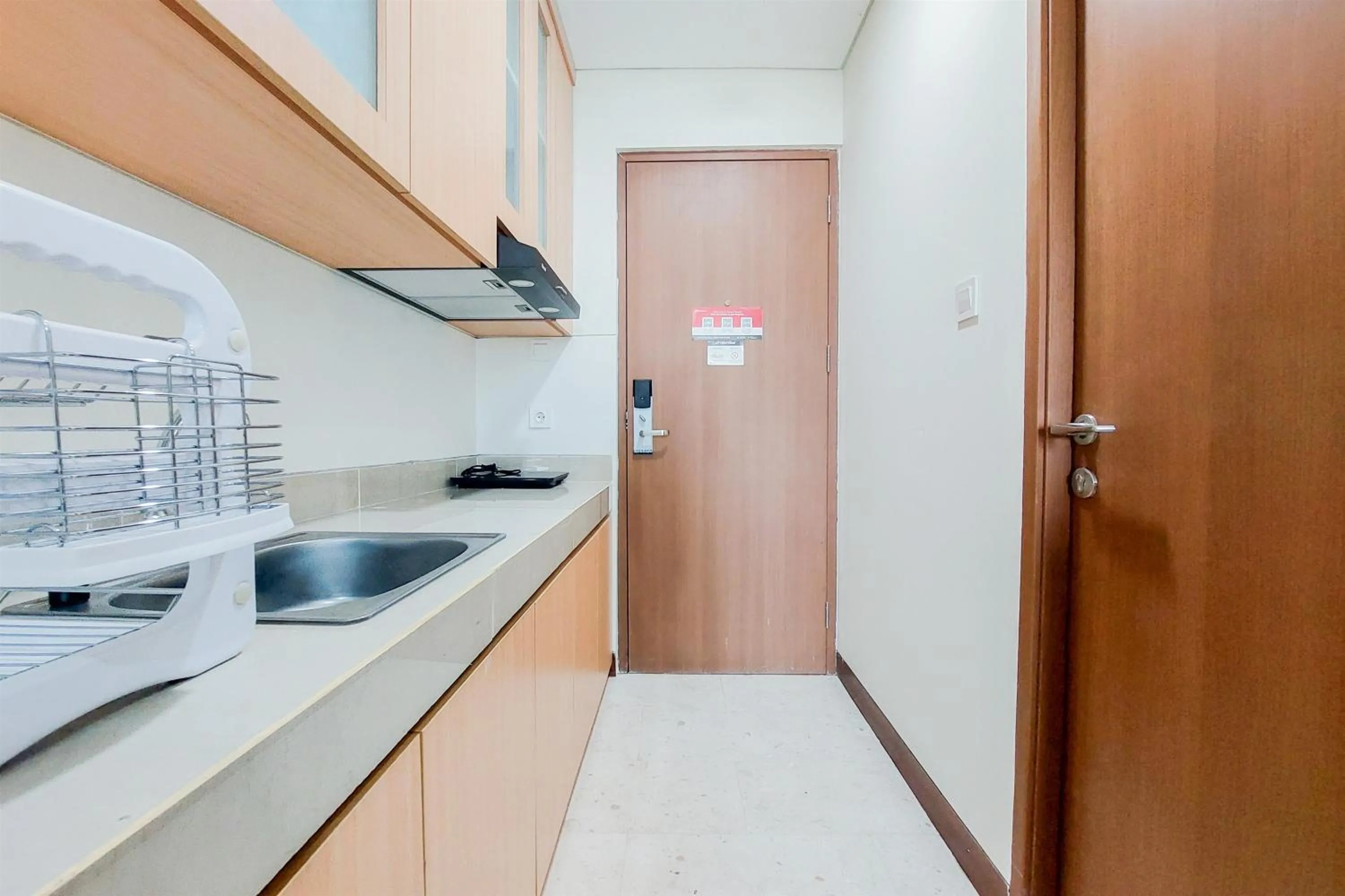 Warm and Simply Look Studio Apartment at B Residence By Travelio