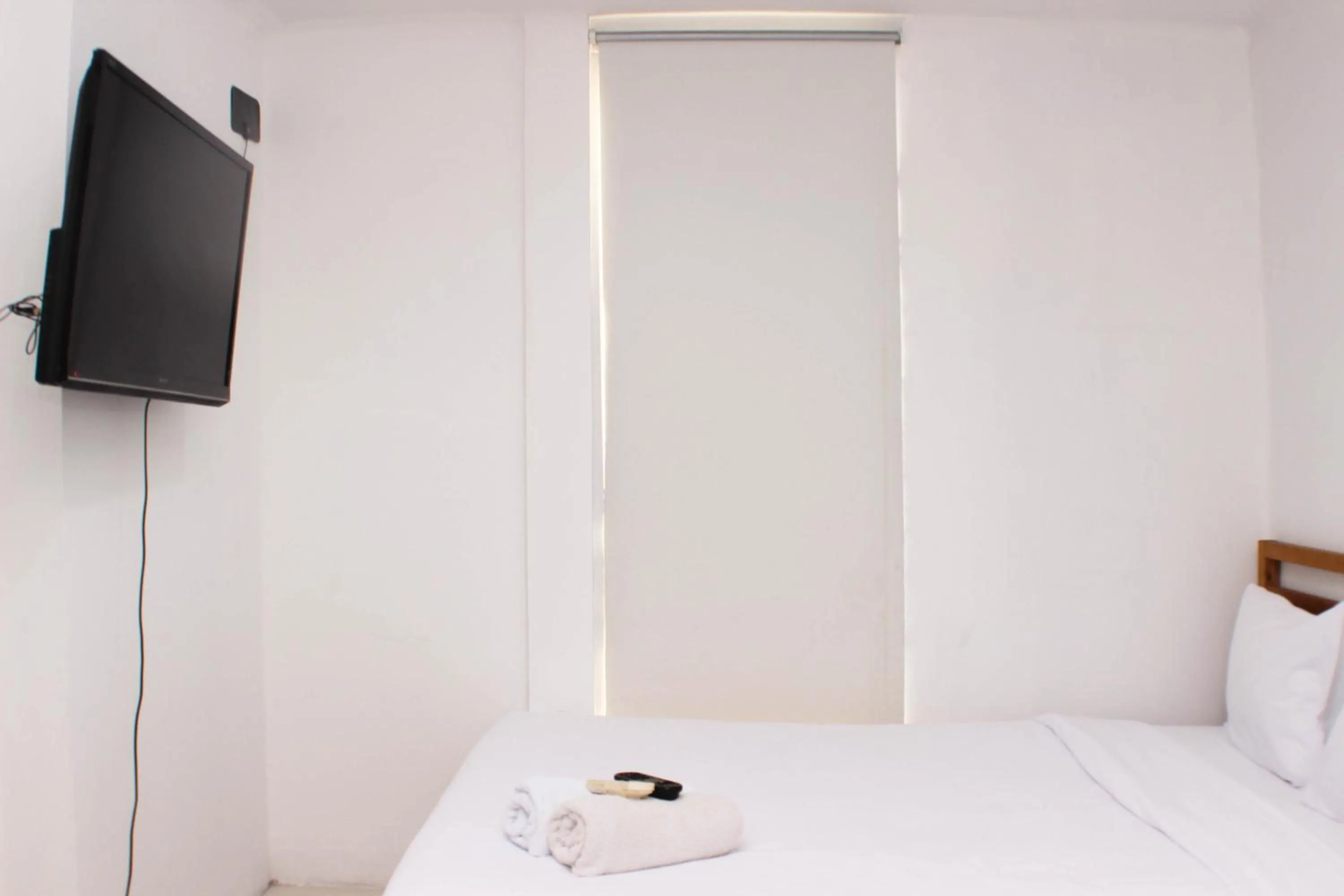 Elegant Studio at Azalea Suites Apartment By Travelio