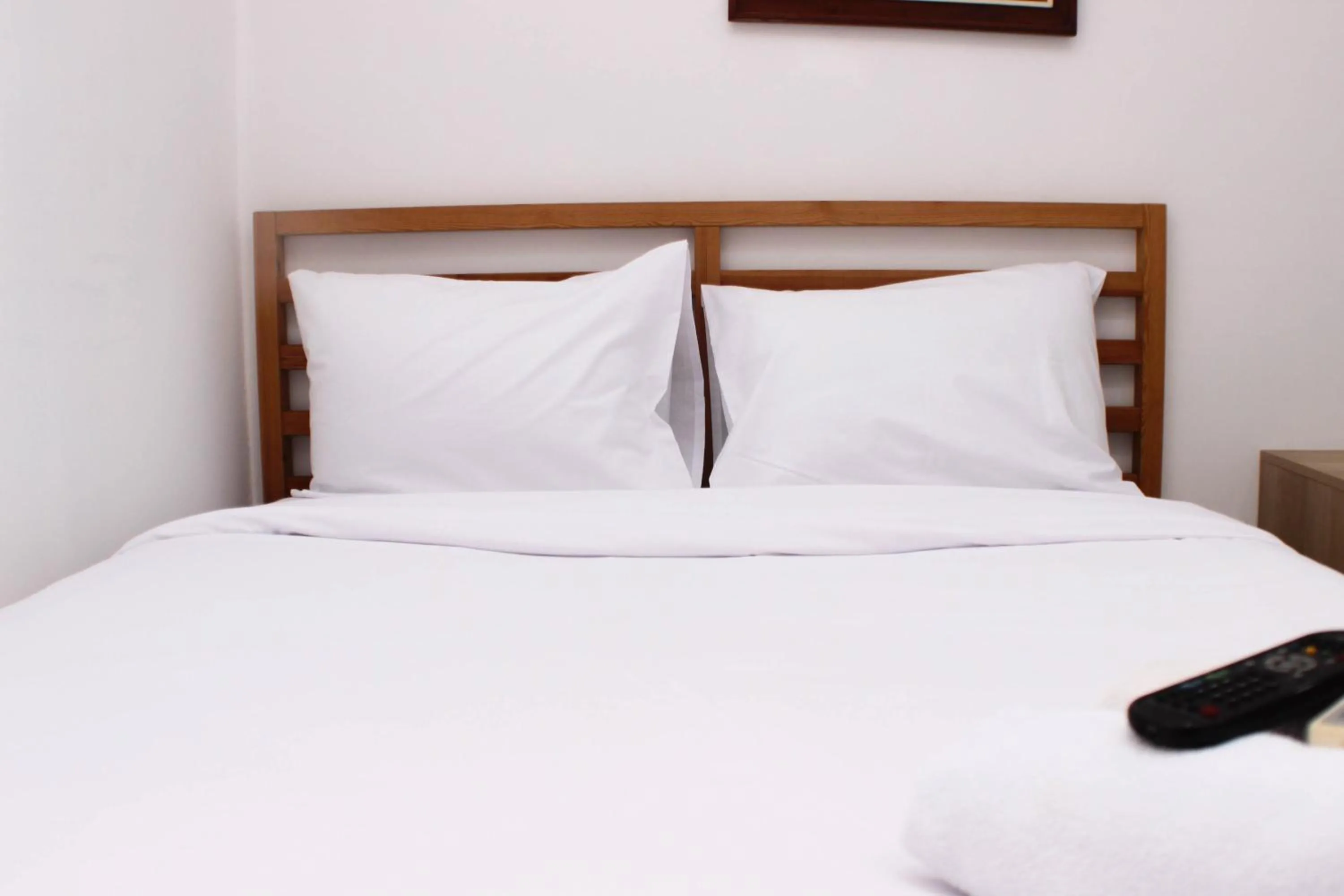 Elegant Studio at Azalea Suites Apartment By Travelio