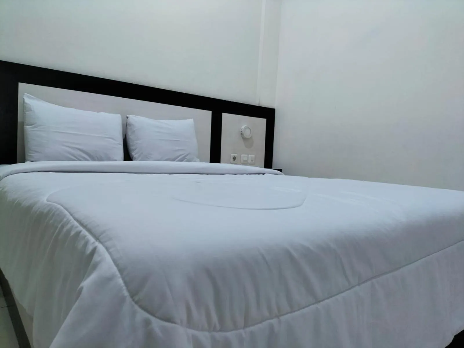 Bed in Hotel Kudus Permata