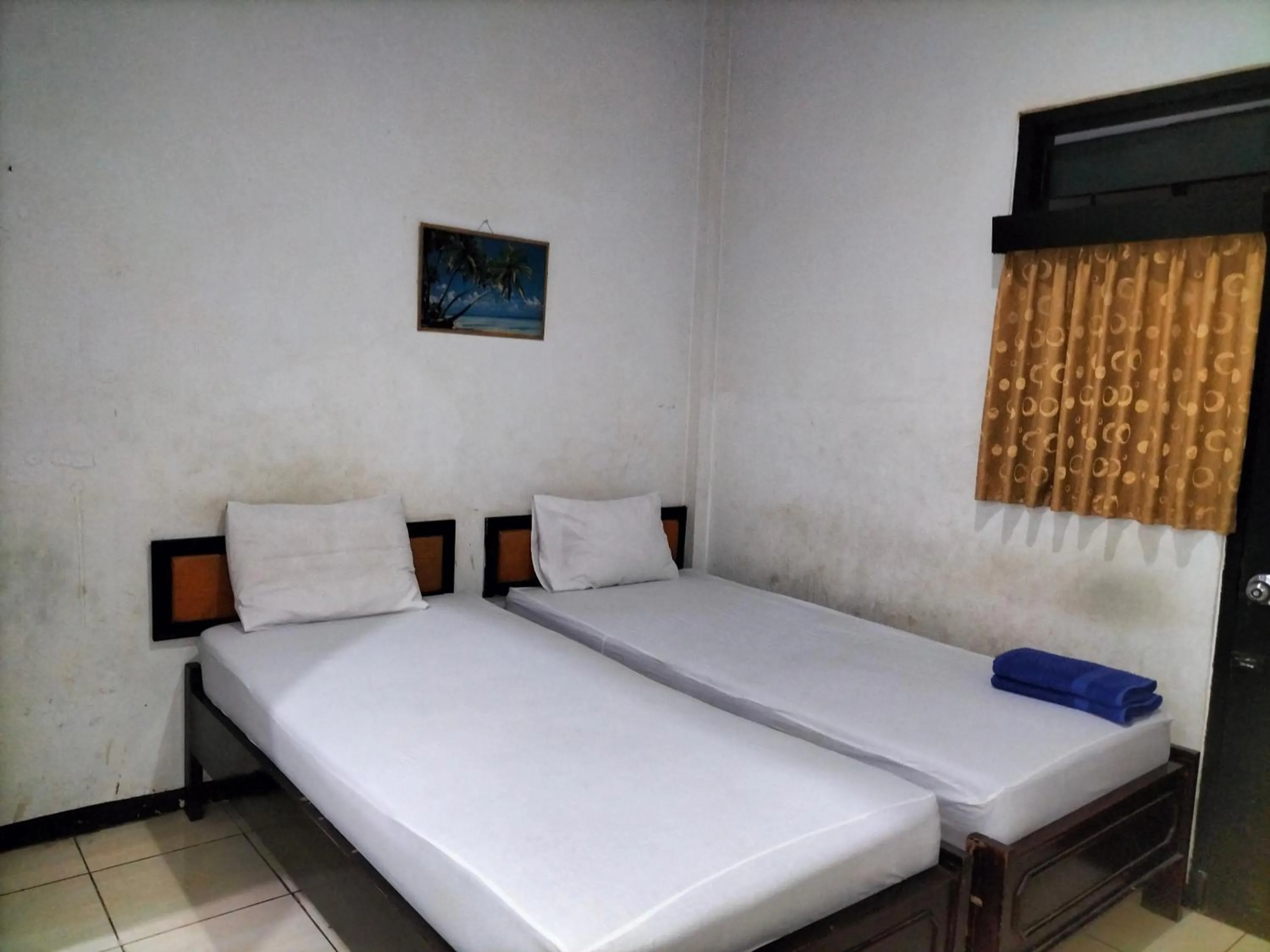 Bed in Hotel Kudus Permata